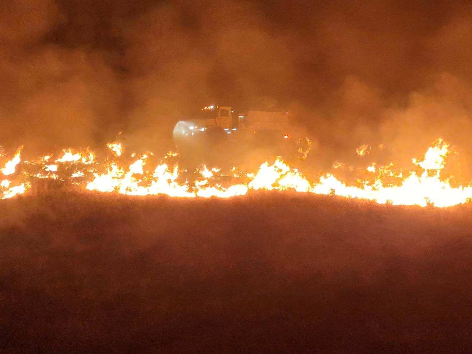 Truck driving through smoke
