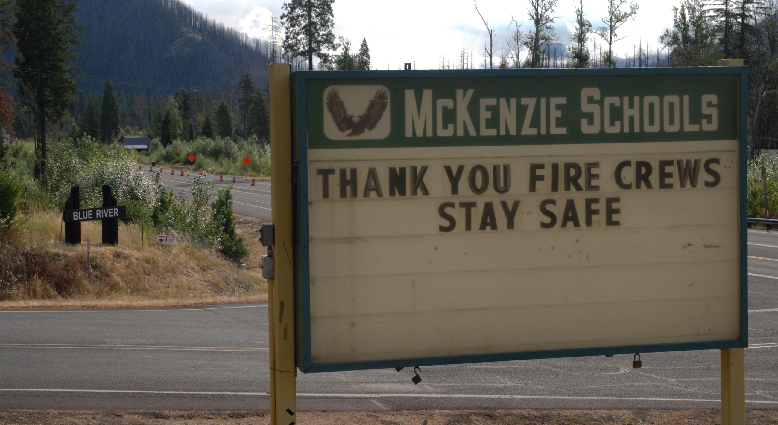 The incident command post for the Ore Fire is at McKenzie Schools in Blue River, OR and the school district’s reader board sign greets firefighters with gratitude and good wishes for their safety. 