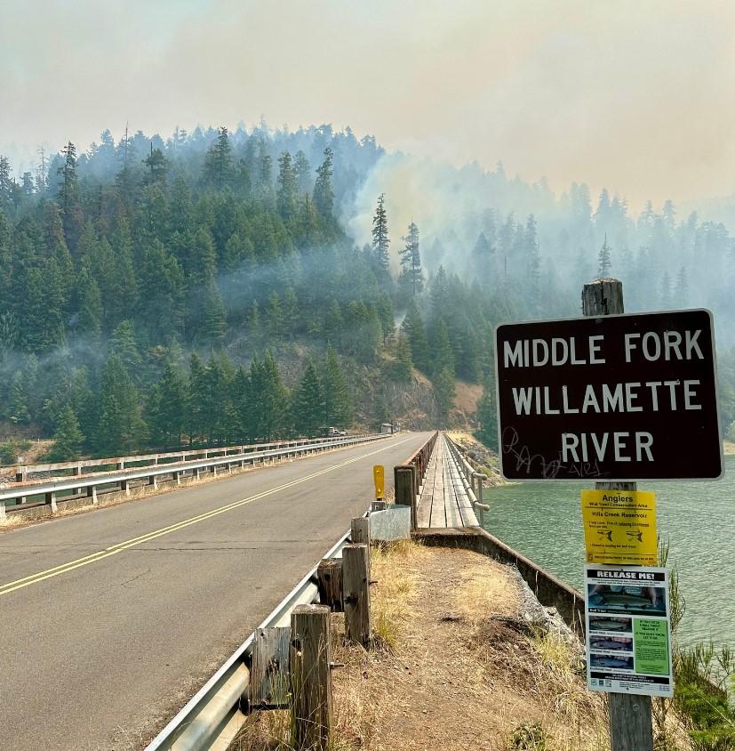 smoke on a slope as fire backs downhill towards bingham boat launch, july 31