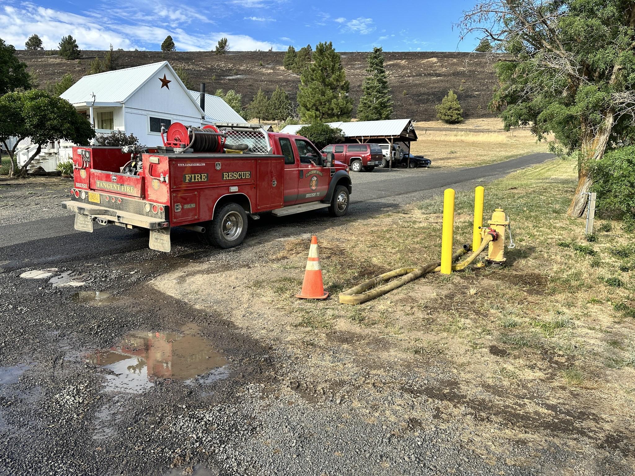 A Structure Protection Engine from Tangent parks by a fire hydrant