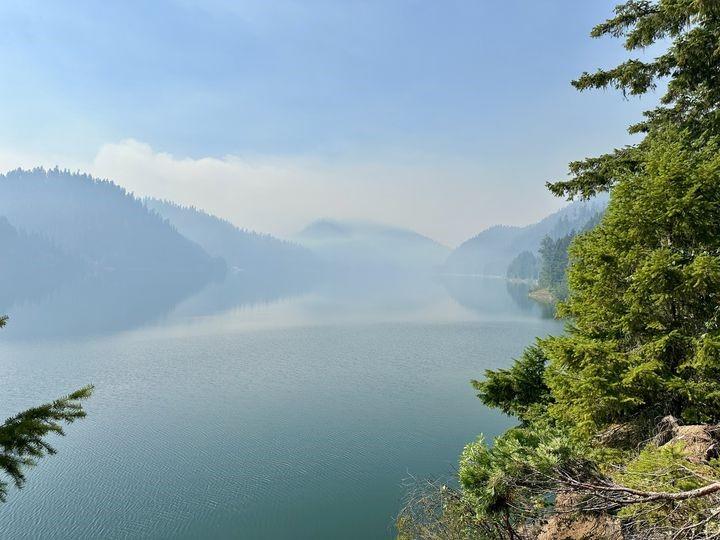smoke over a lake from one of the oakridge lightning fires 2024