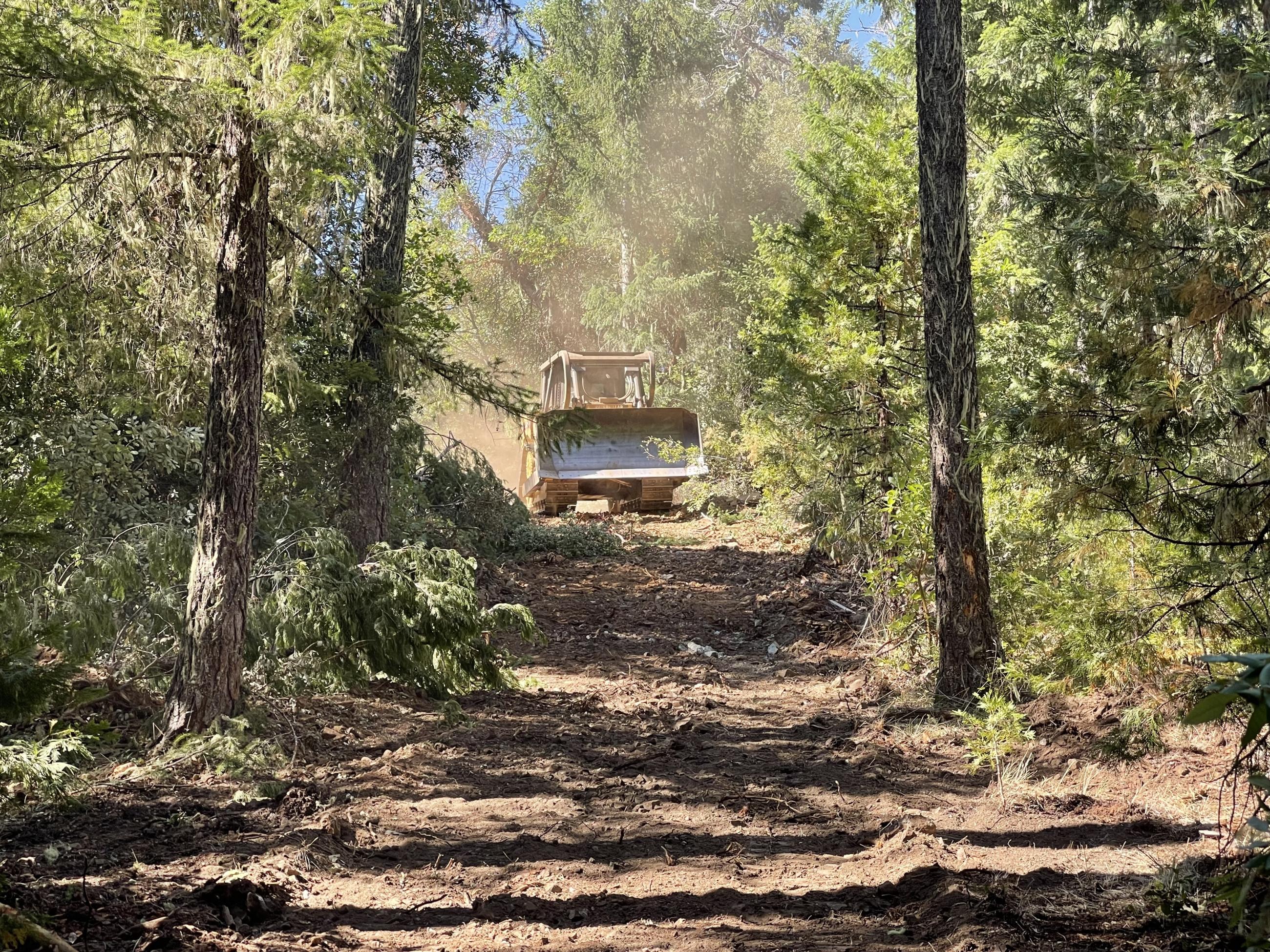 dozer working on wireline