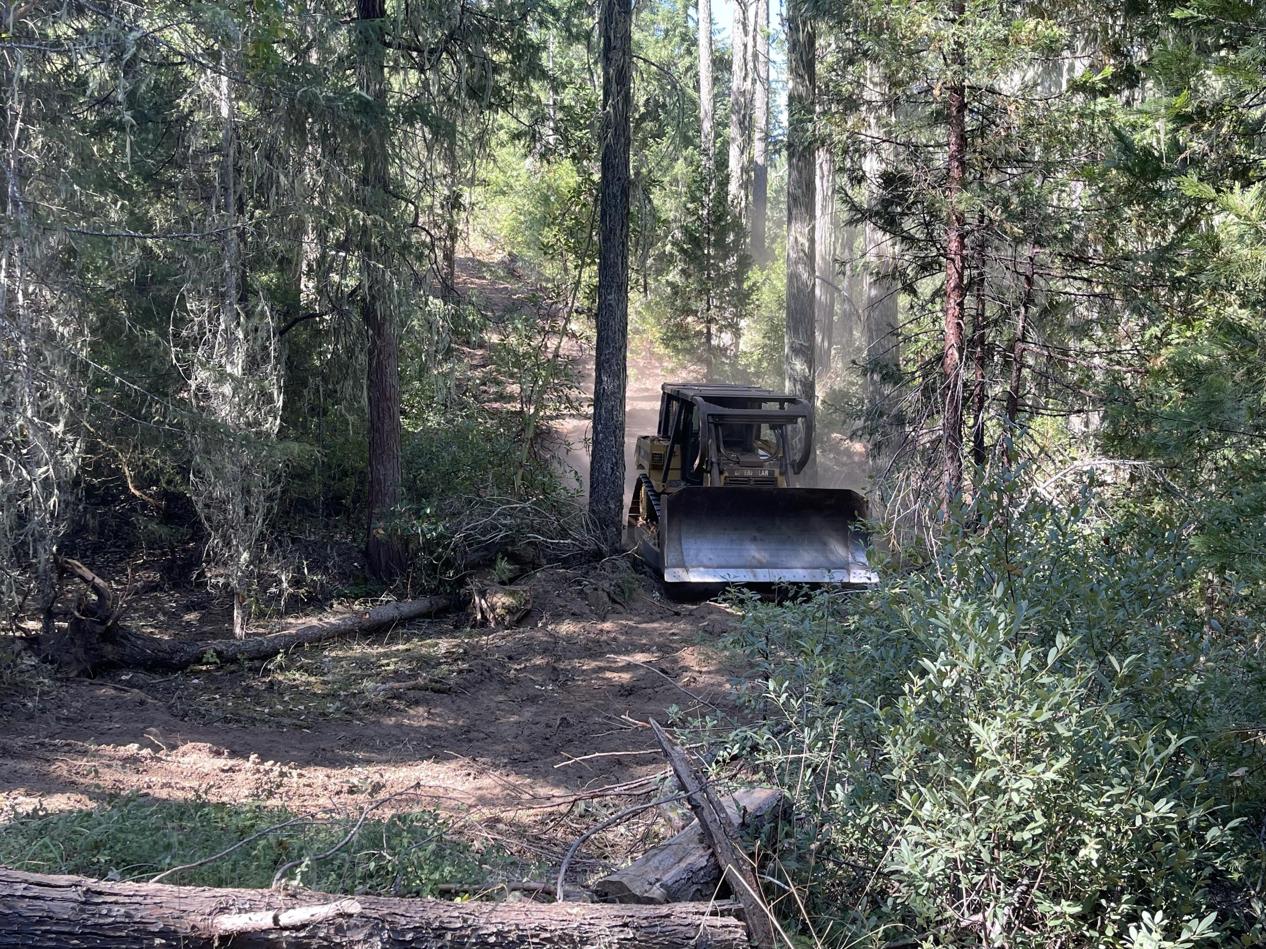 dozer working on wireline