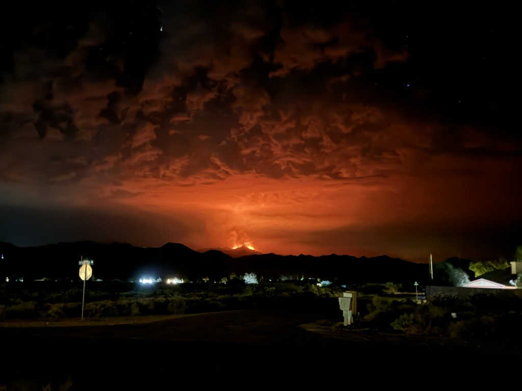 Nighttime photo of the Element Fire in the distance.  