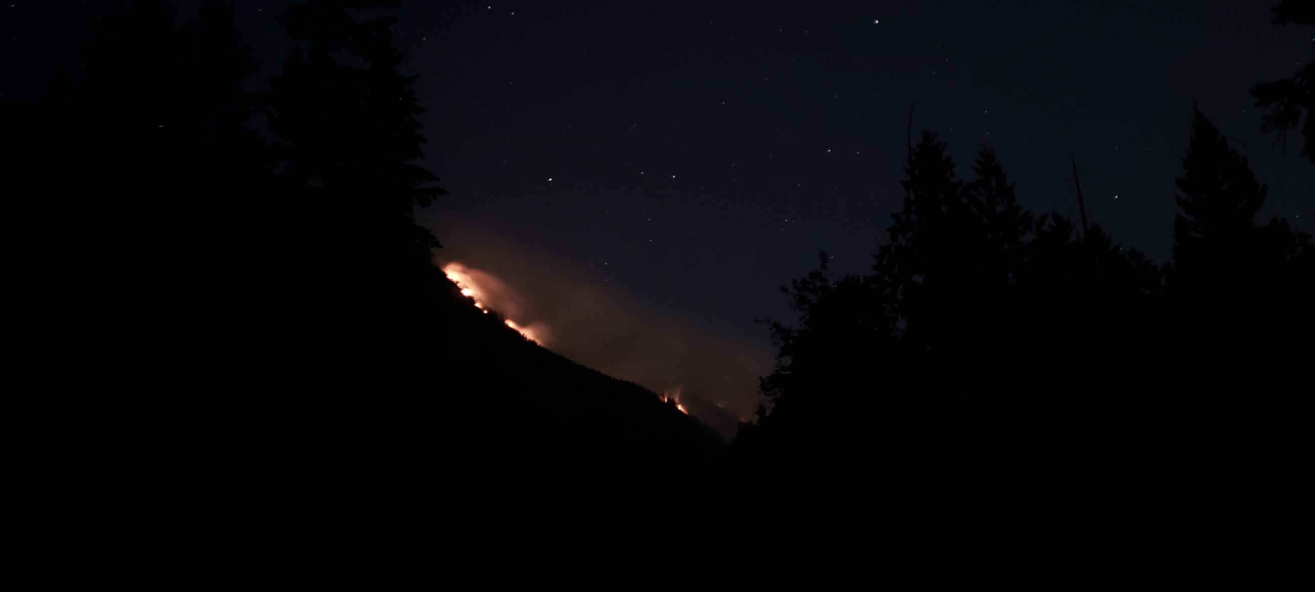 The Ruby Fire on the night of 8/15/24, photo taken at the entrance to the closed Colonial Creek South Campground