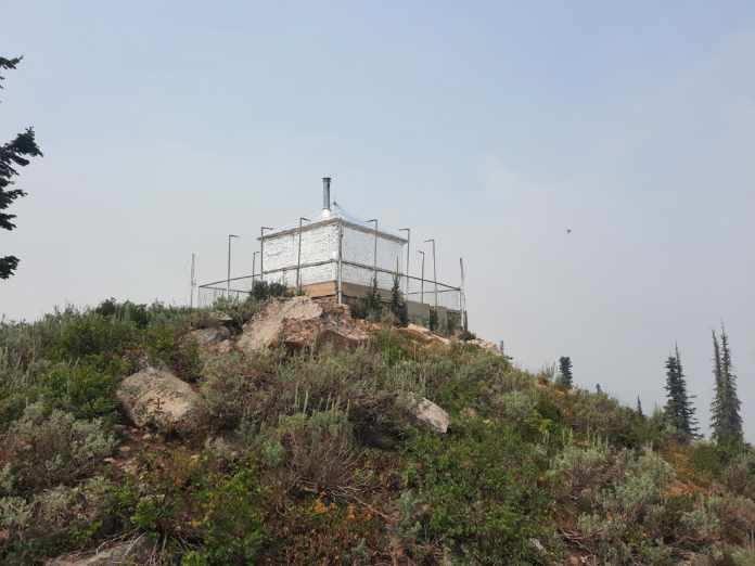 View of Deadwood Lookout Wrapped in Protective Film to provide protection from heat and embers.