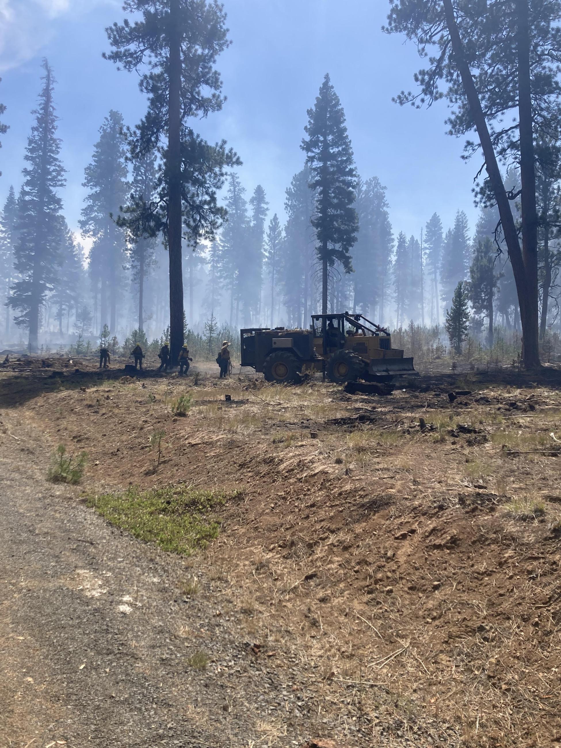 There are currently 12 Skidgines on the Falls and Telephone Fires. These are combinations of a skidder and an engine helping with mop up and securing containment lines