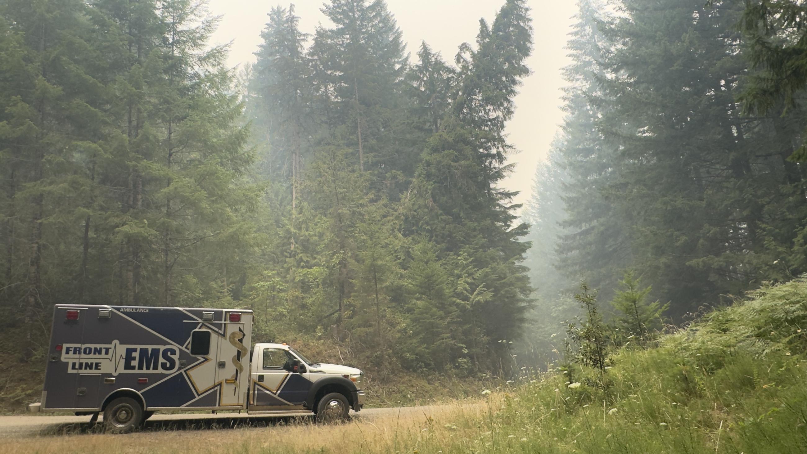 ambulance in smoky forest