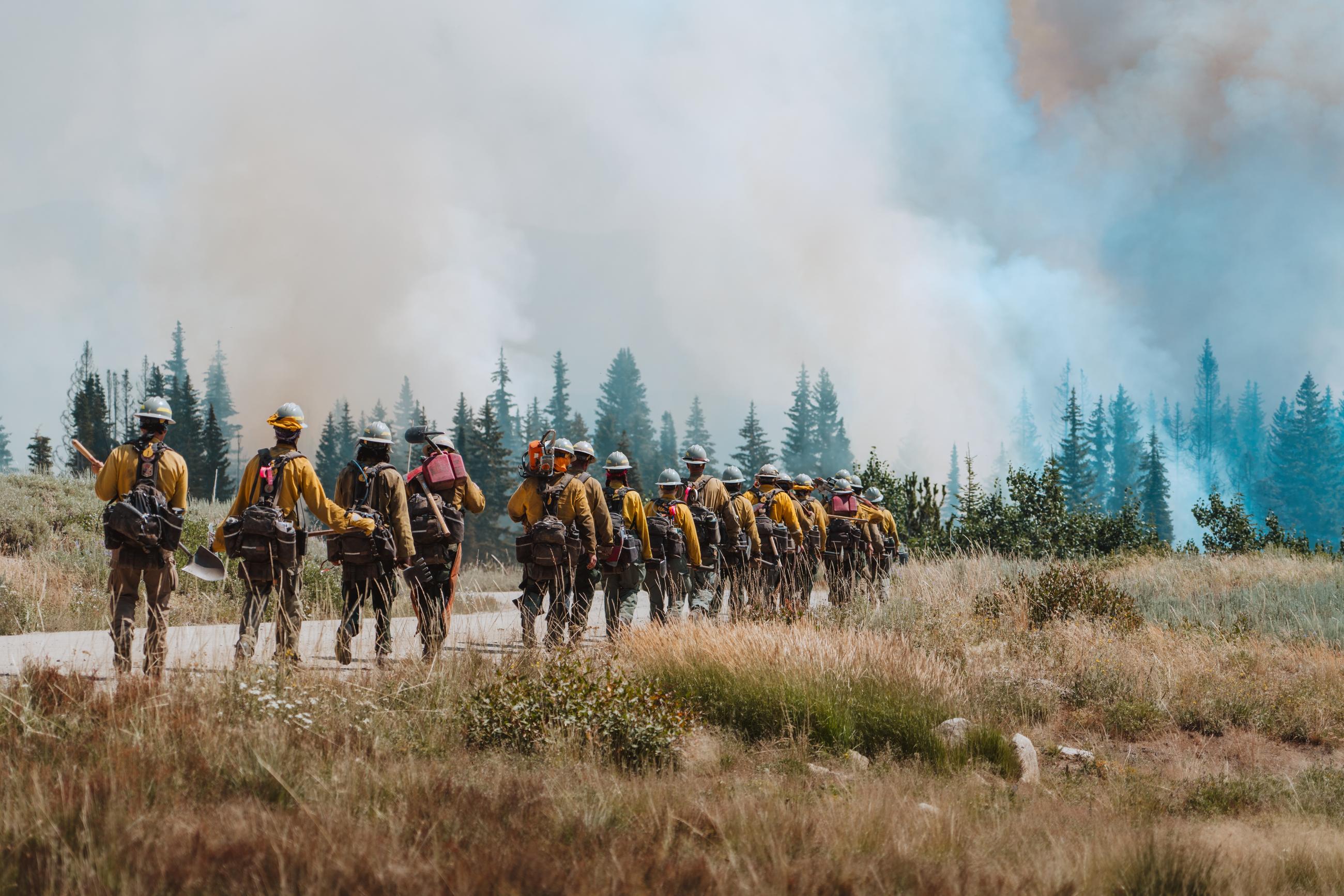 Crew holding line during firing ops