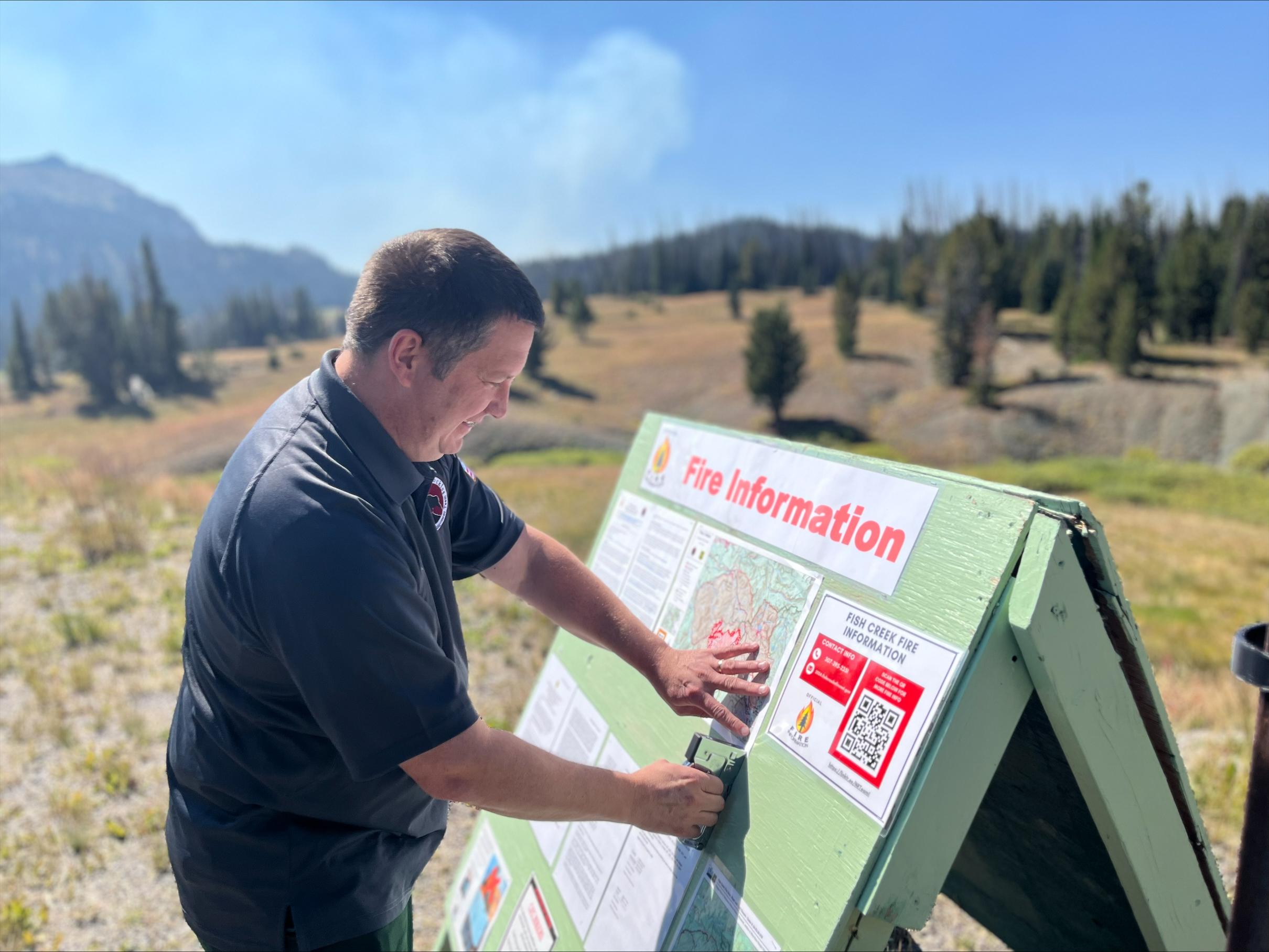 Fire Information staff provide updates for the public