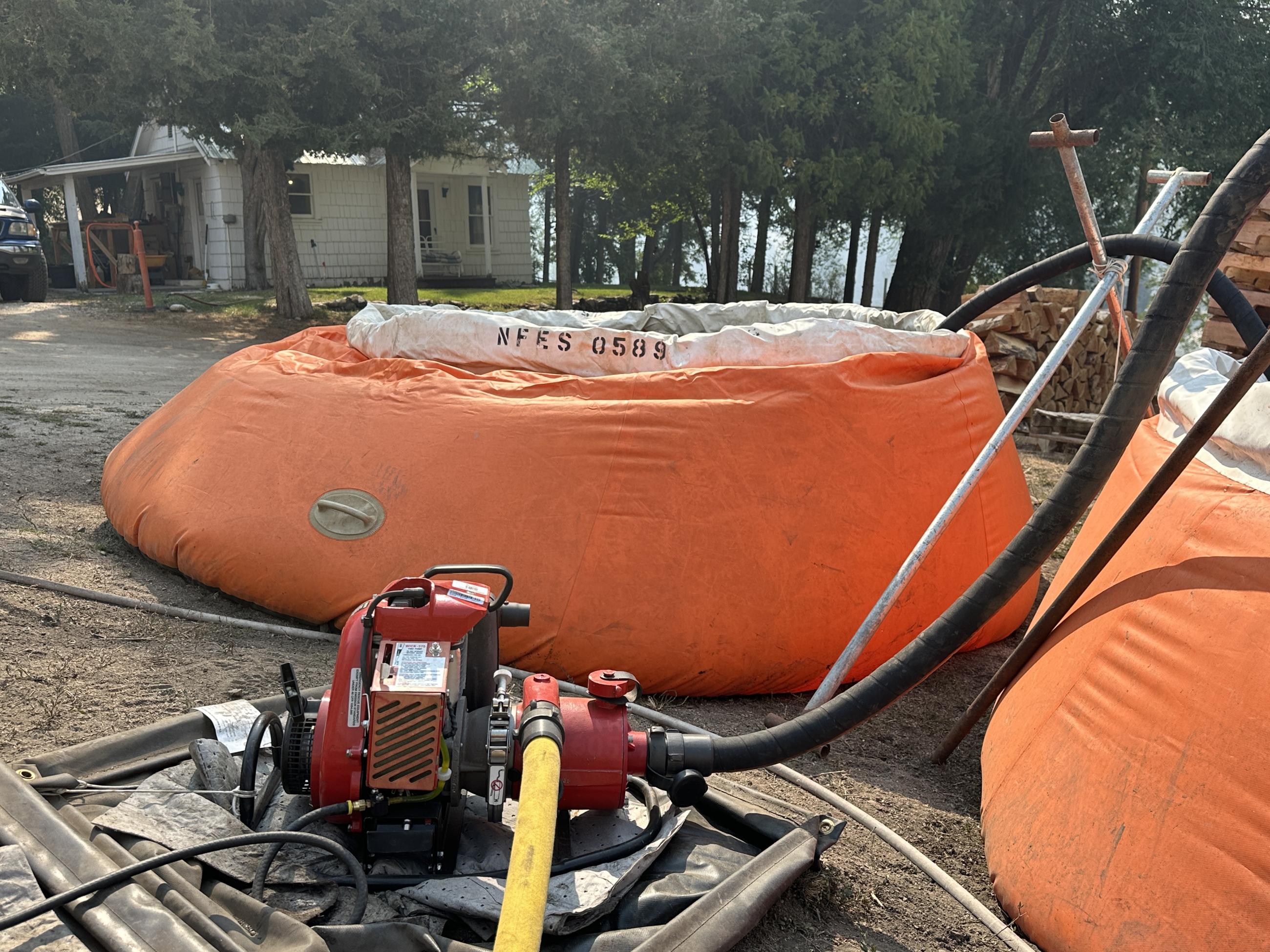 orange tanks with water in them