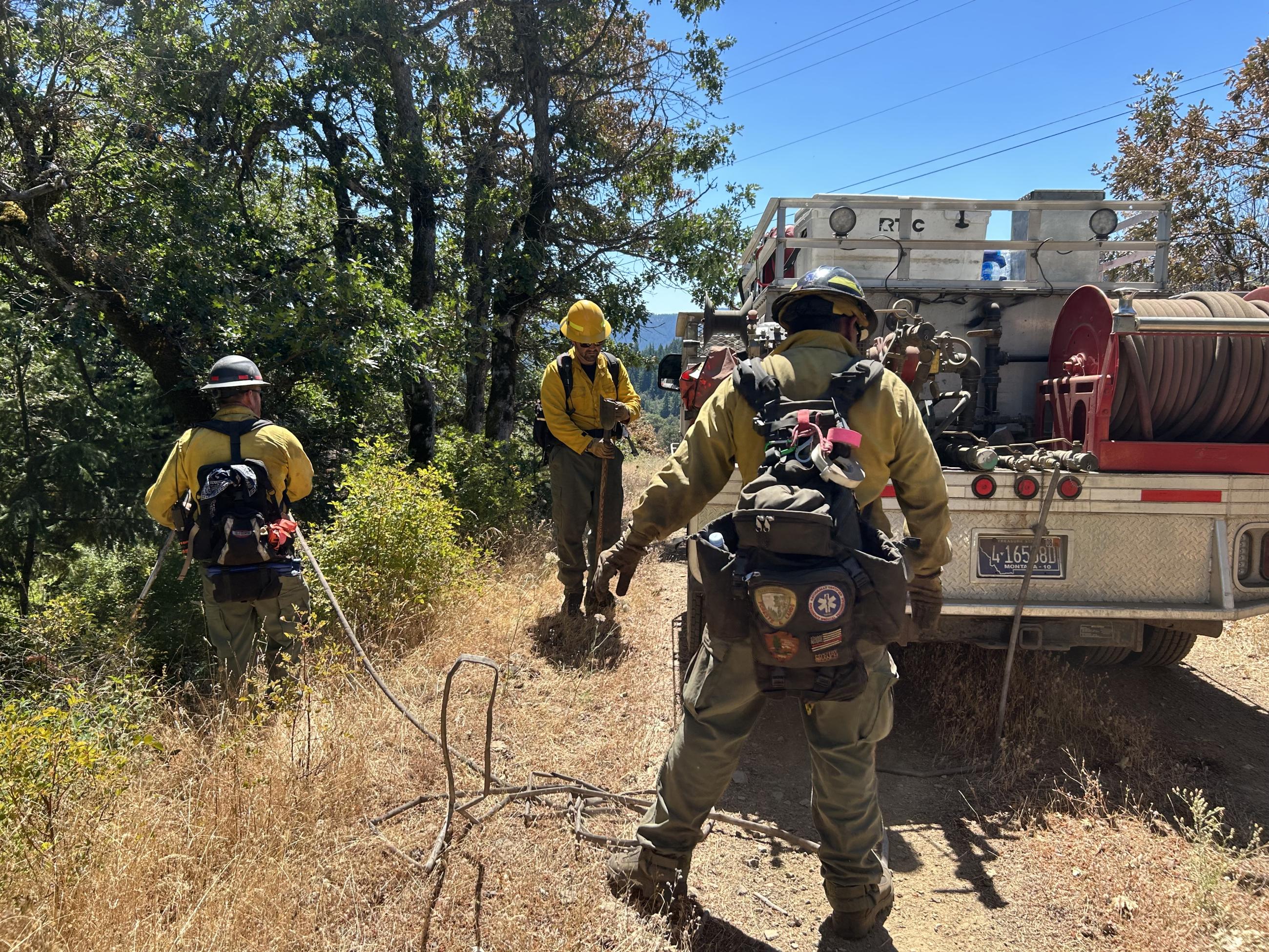 New Hampshire Crew Pulls Hose to Water Down Hot Spots