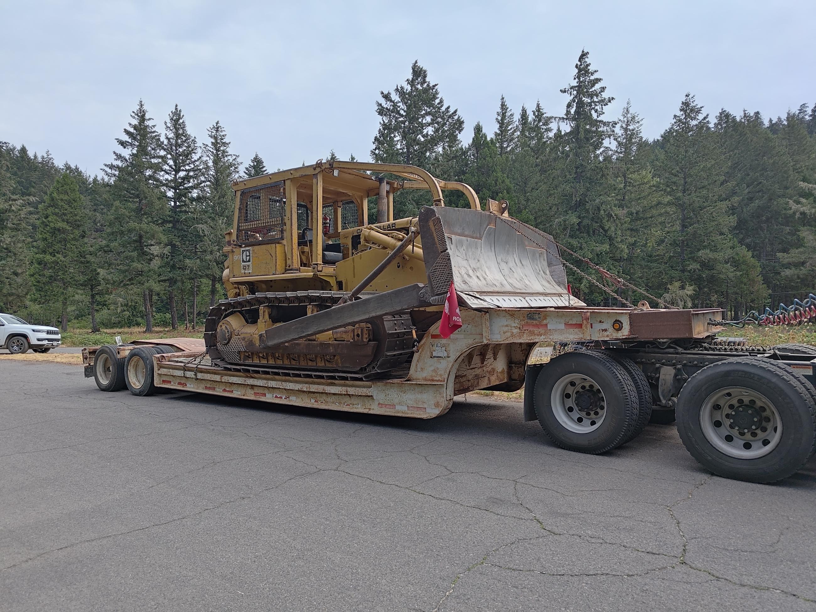 Small dozer on trailer