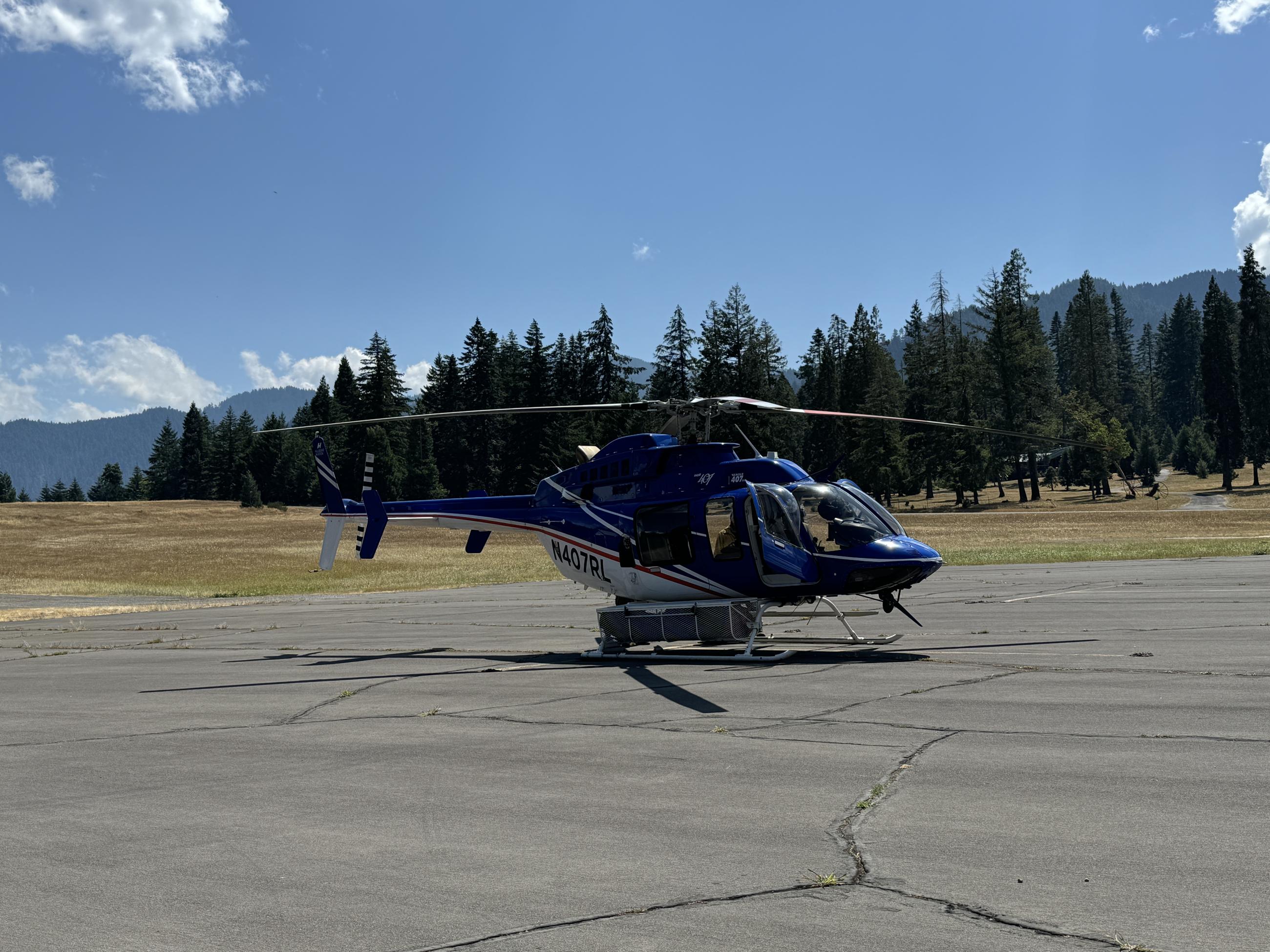 blue helicopter parked