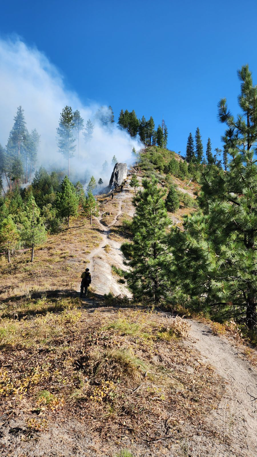 Lightning Creek Trail with smoke from strategic firing operation