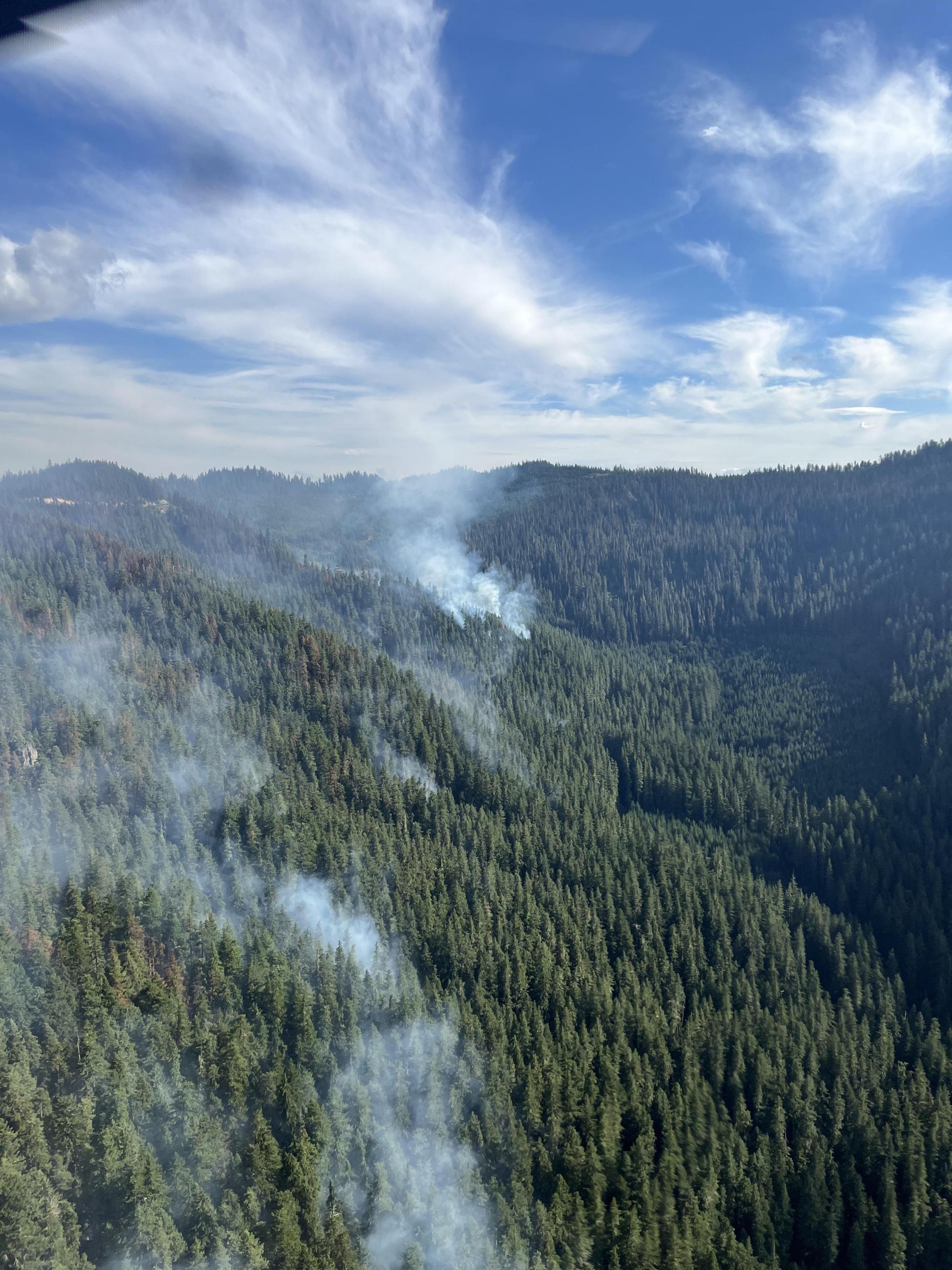 multiple smokes on the landscape aerial photo