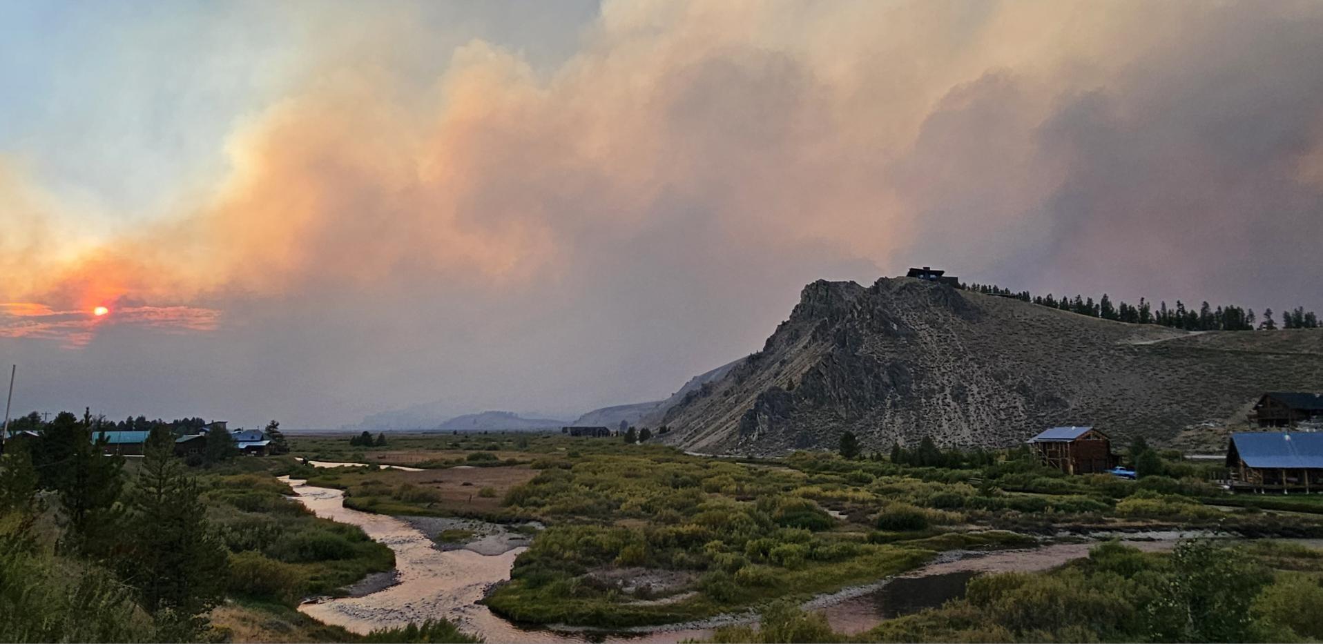 smoky sunset behind mountains