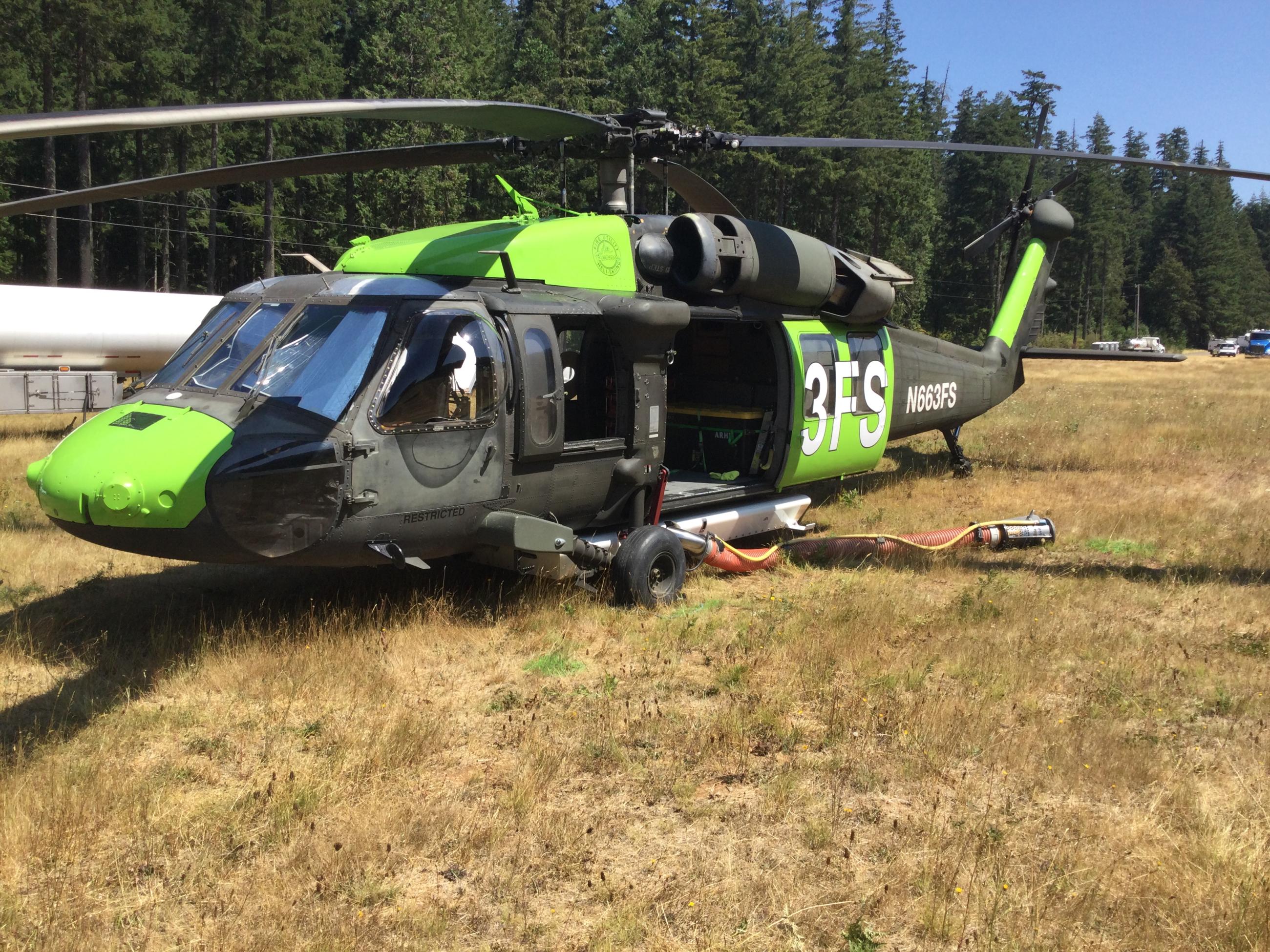 Large helicopter with green paint