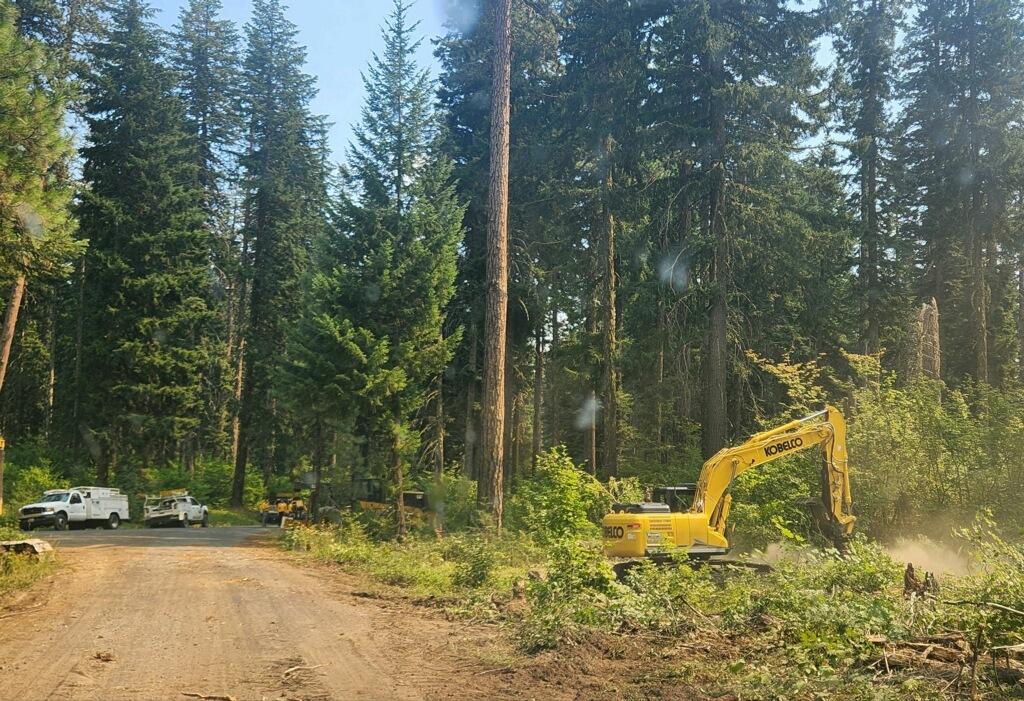 Heavy equipment working to create a fire barrier on 8/8/24