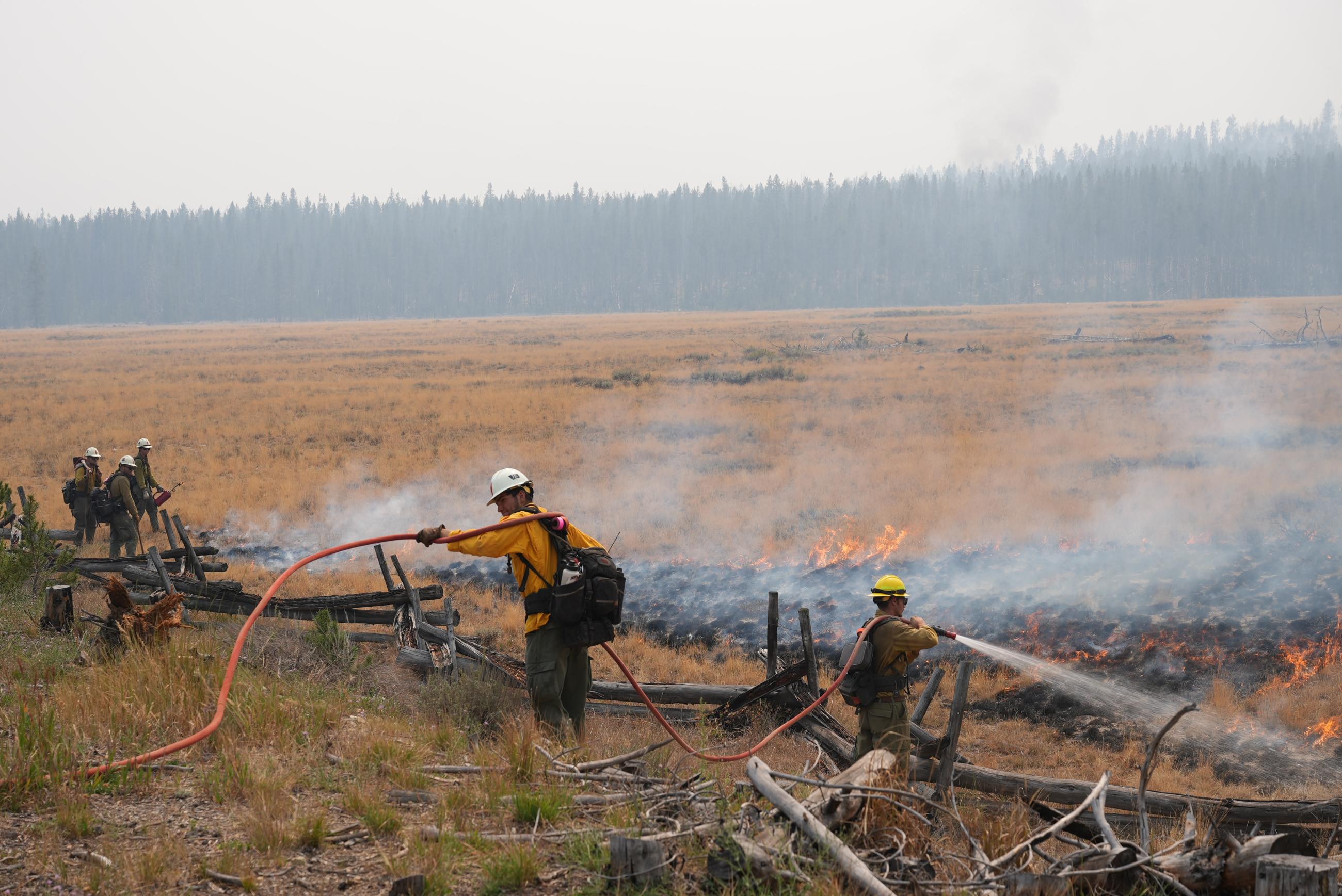 Firefighters Working Along Hwy 21 West of Stanley, August 26