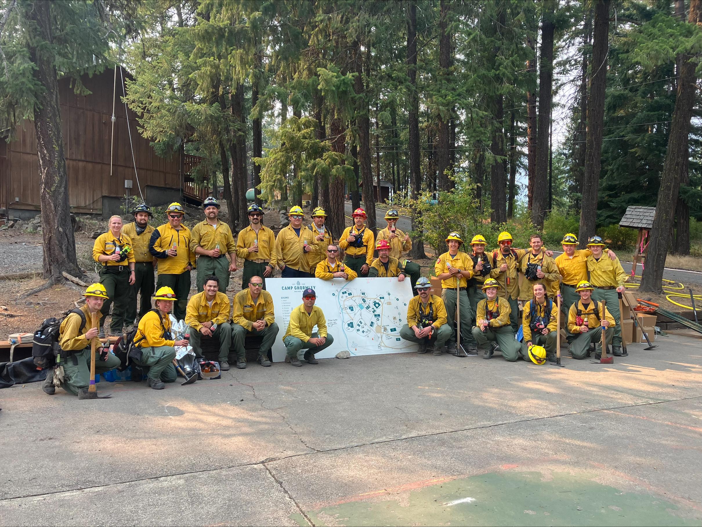 Group of firefighters pose for a picture 