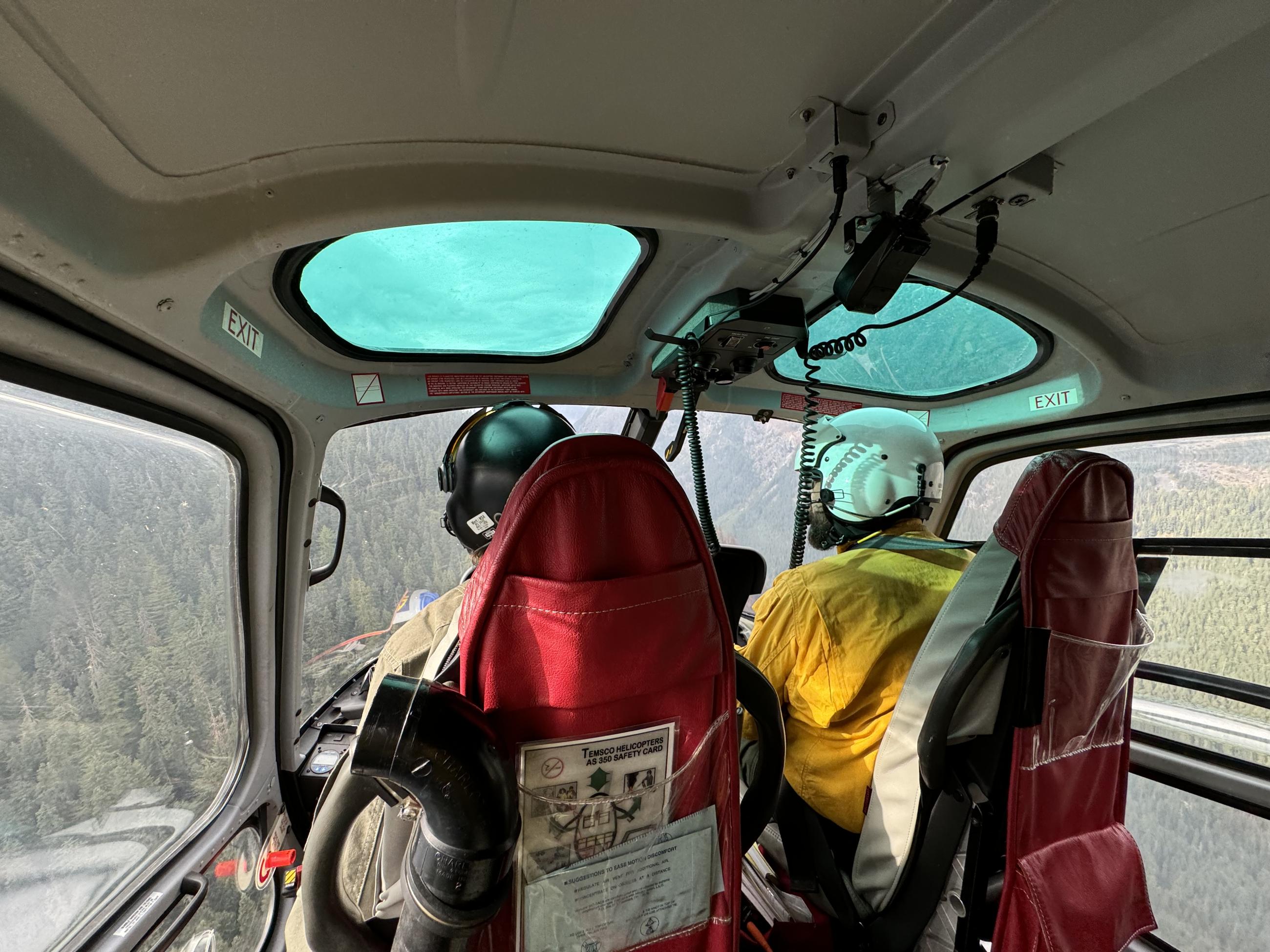 Helicopter Pilot navigates over Ruby Fire