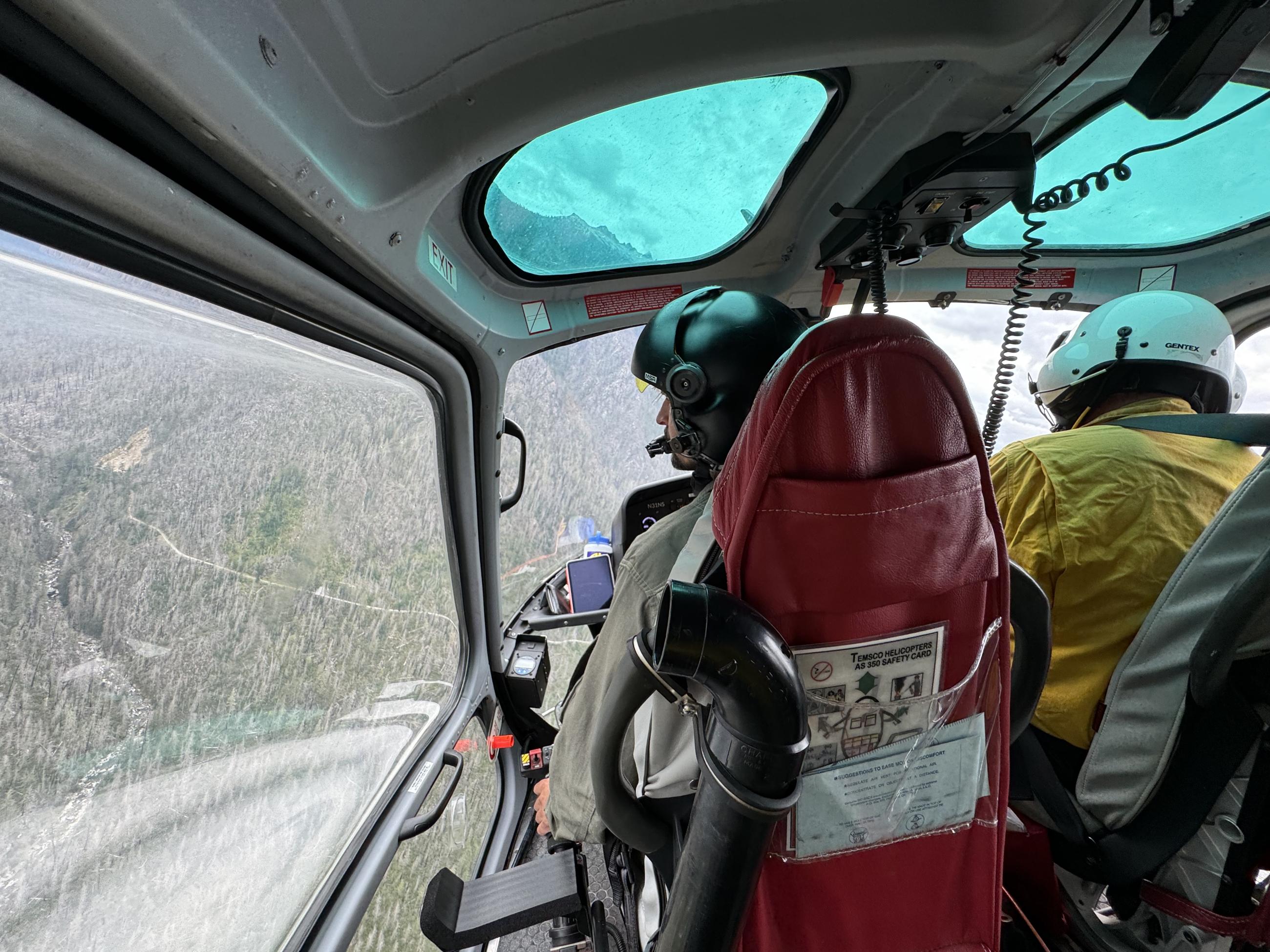 Helicopter Pilot navigates over Ruby Fire