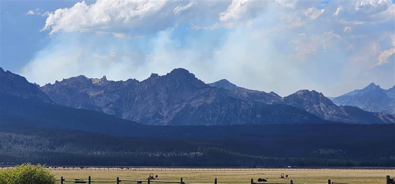 smoke seen behind mountains west of hwy 75 9/2