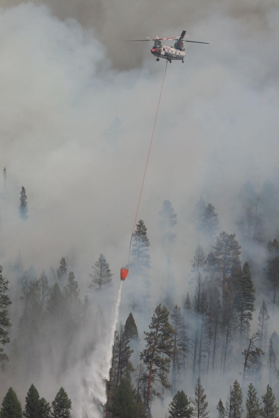 Chinook Type 1 Helicopter Drops Water on Forest Fire #2