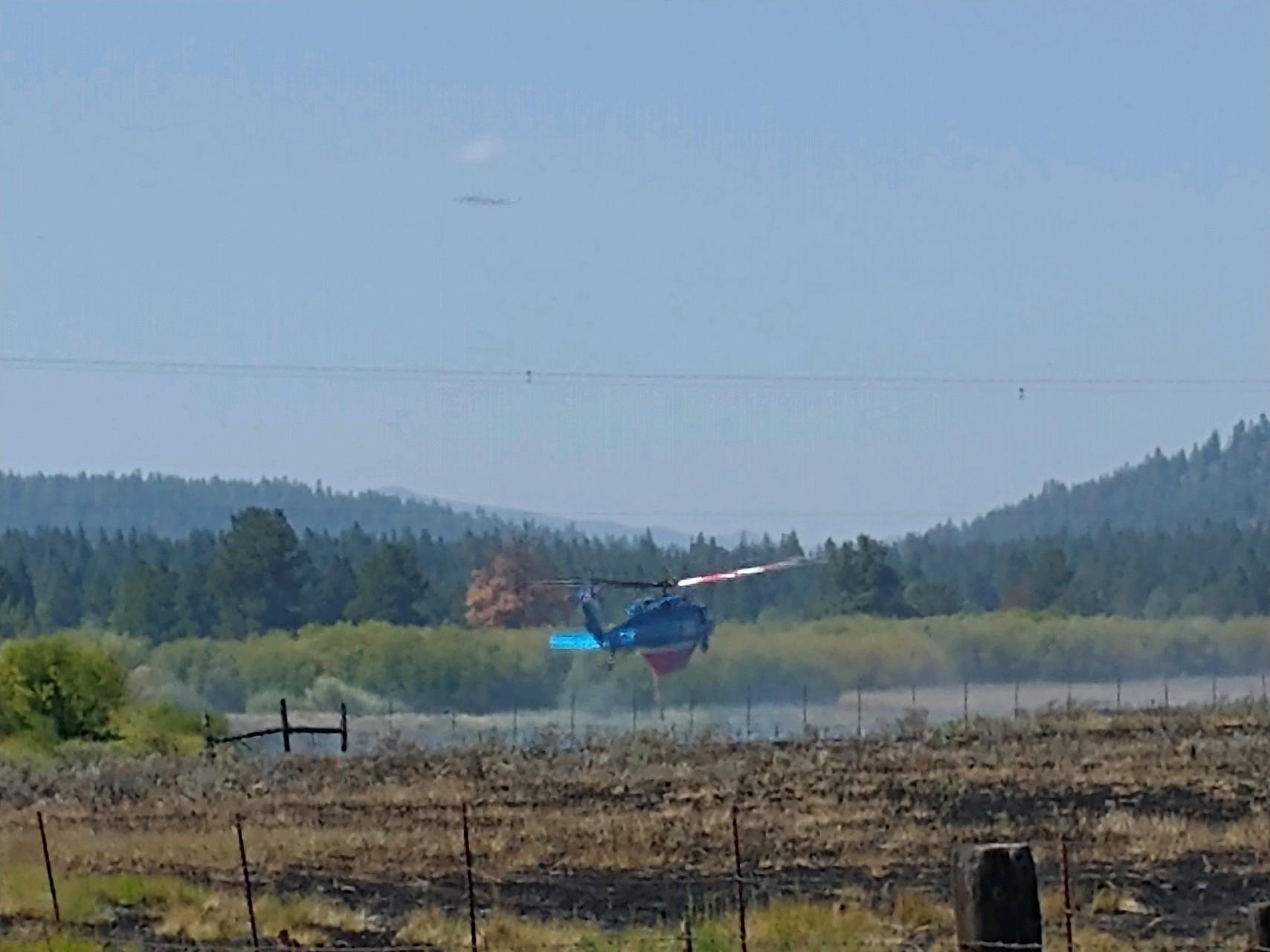 Helicopter refilling water