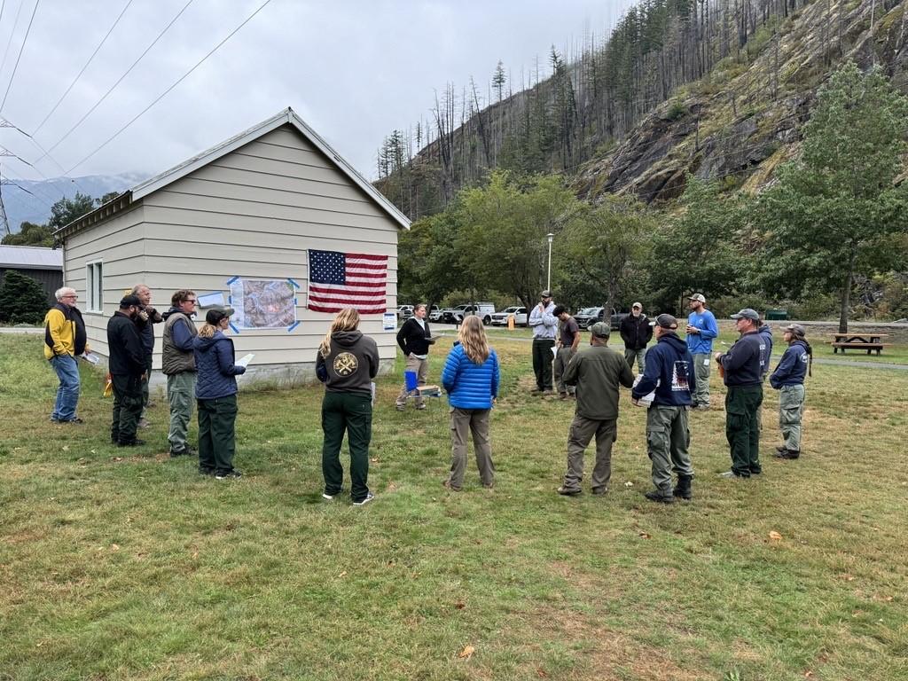 Firefighters attend morning briefing for Ruby Fire 