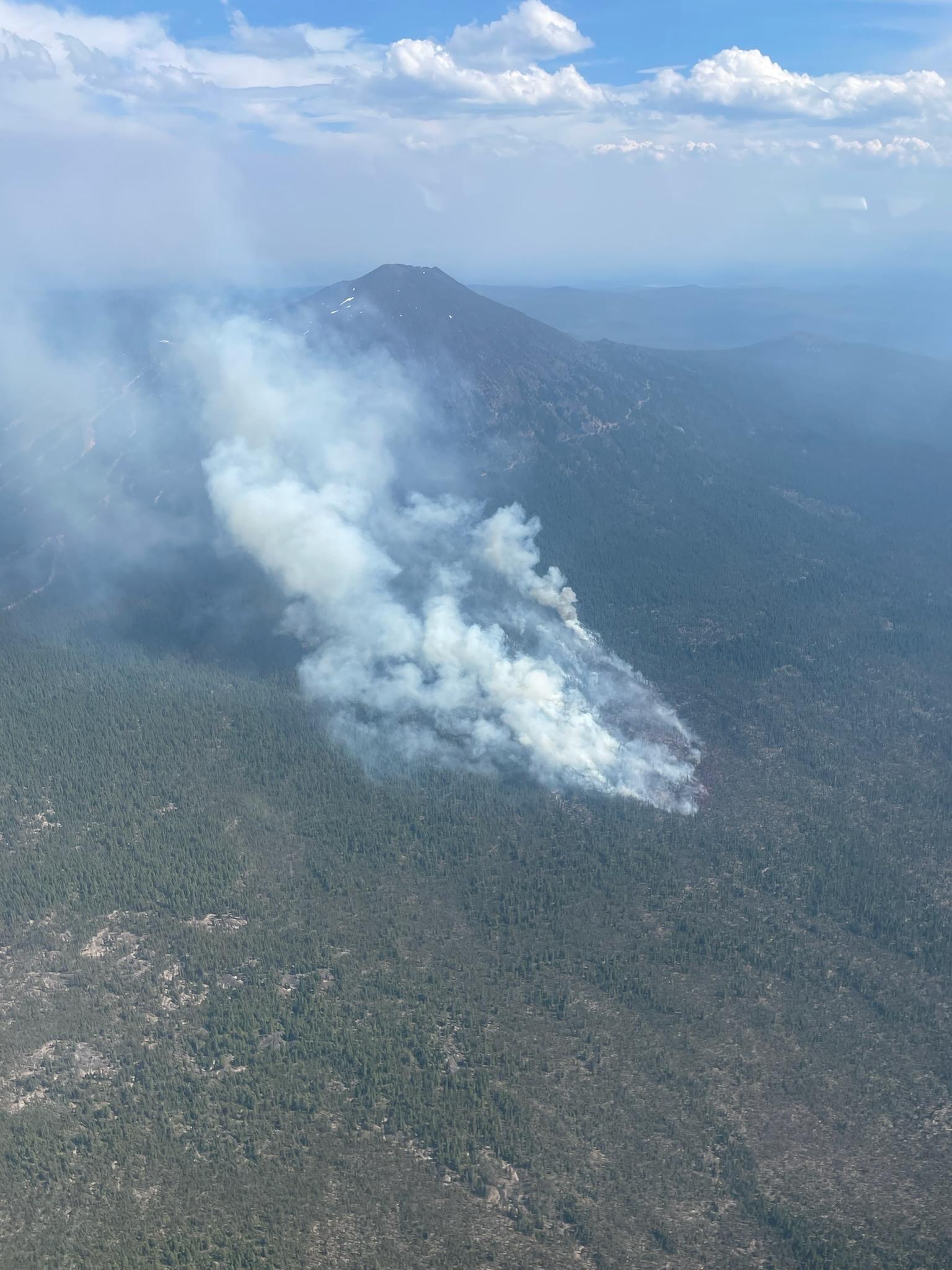 Aerial photograph of smoke rising from the Backside Fire. 