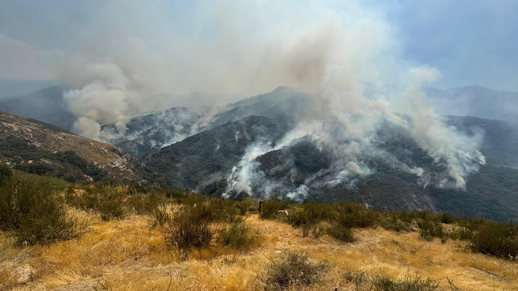 Smoke over mountains and valleys