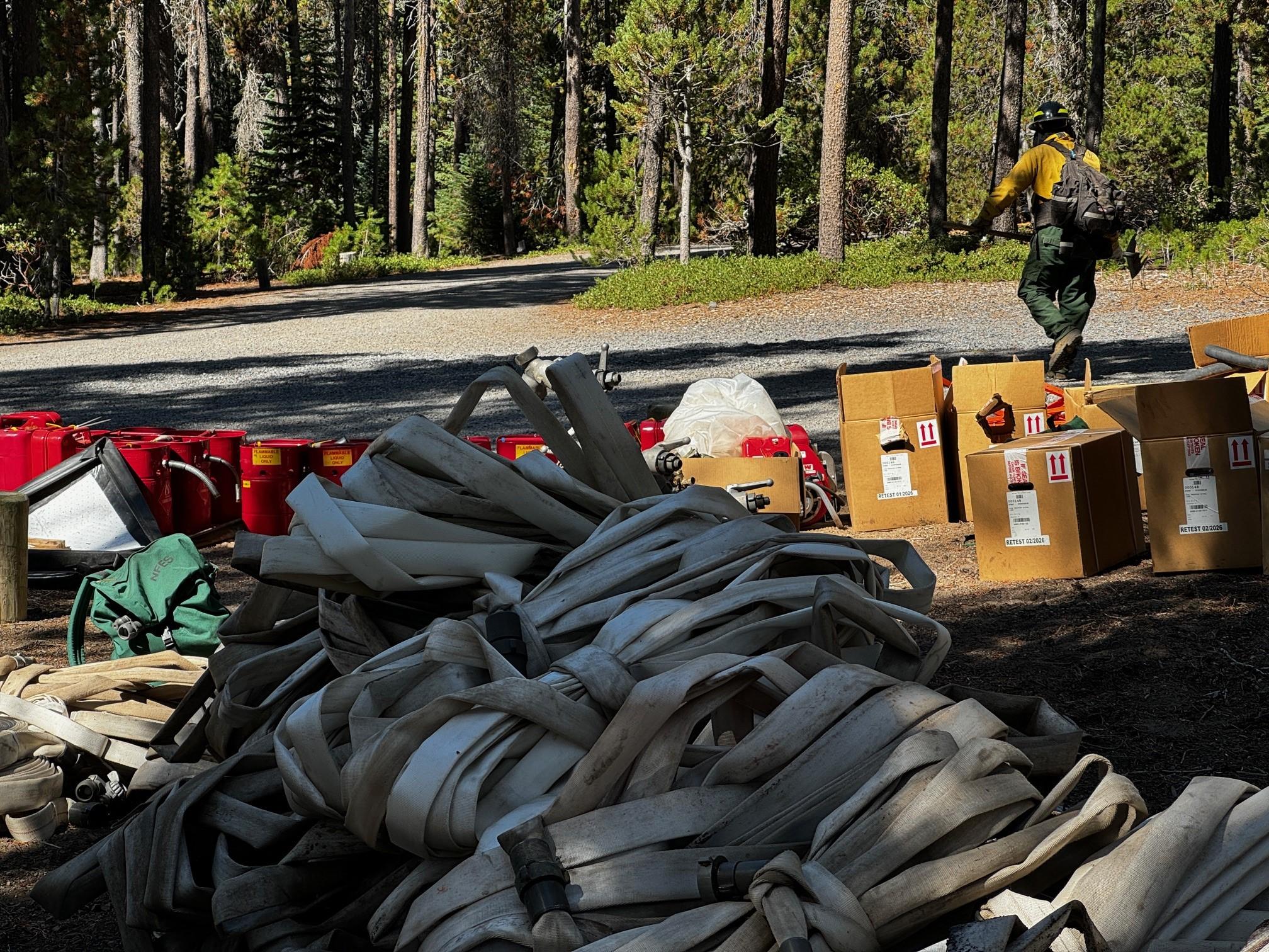 Pile of fire hose and other equipment ready for back haul