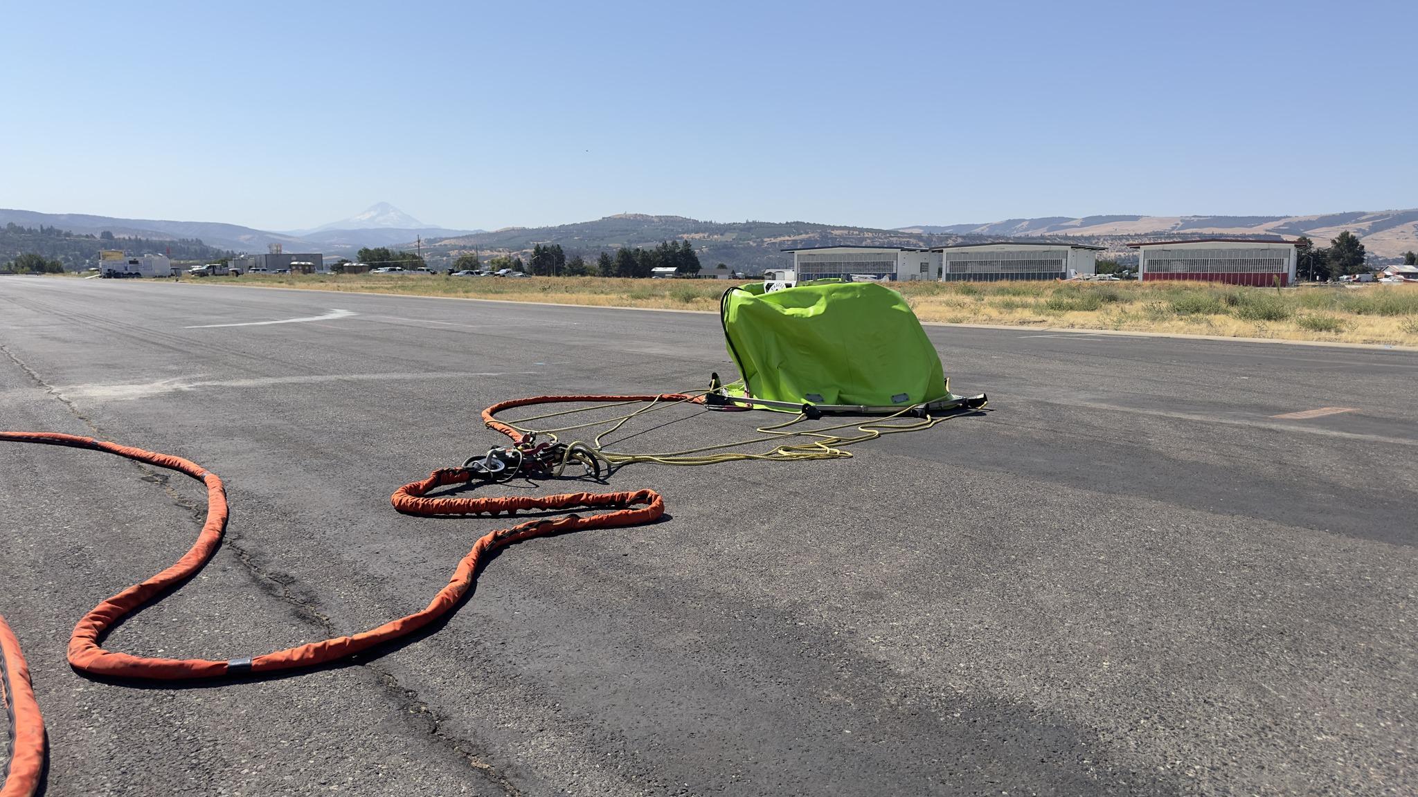 700-gallon water bucket used by a helicopter