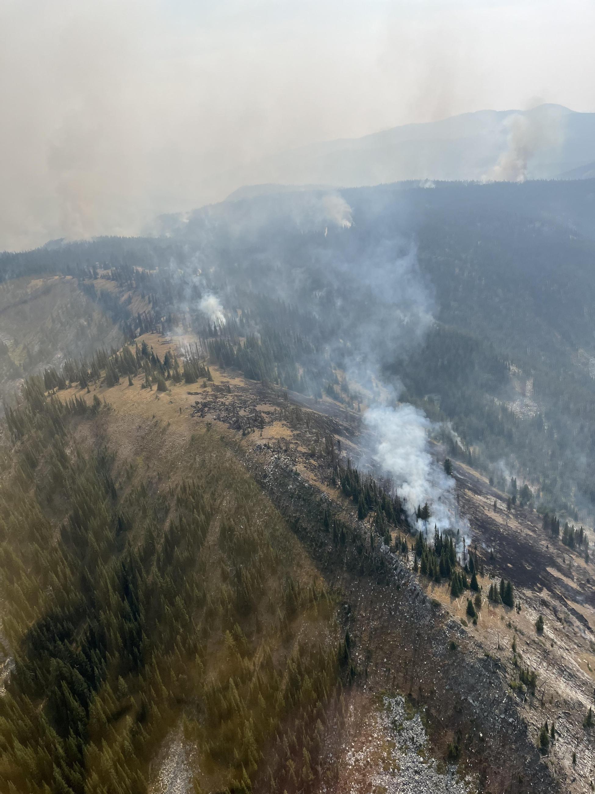 Aerial view of smoke on the Moore Square Complex