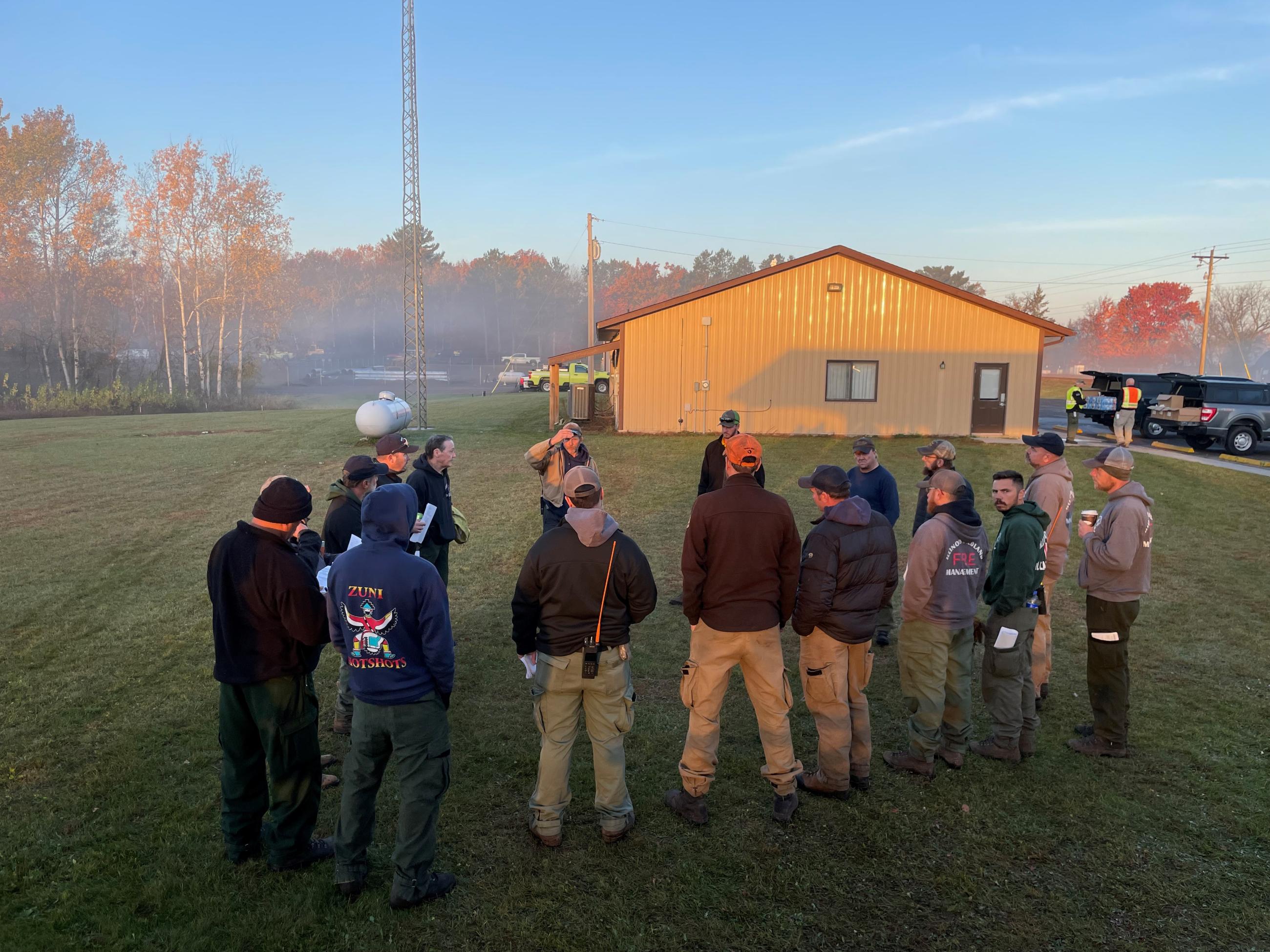 A group of people in the early morning gathered 