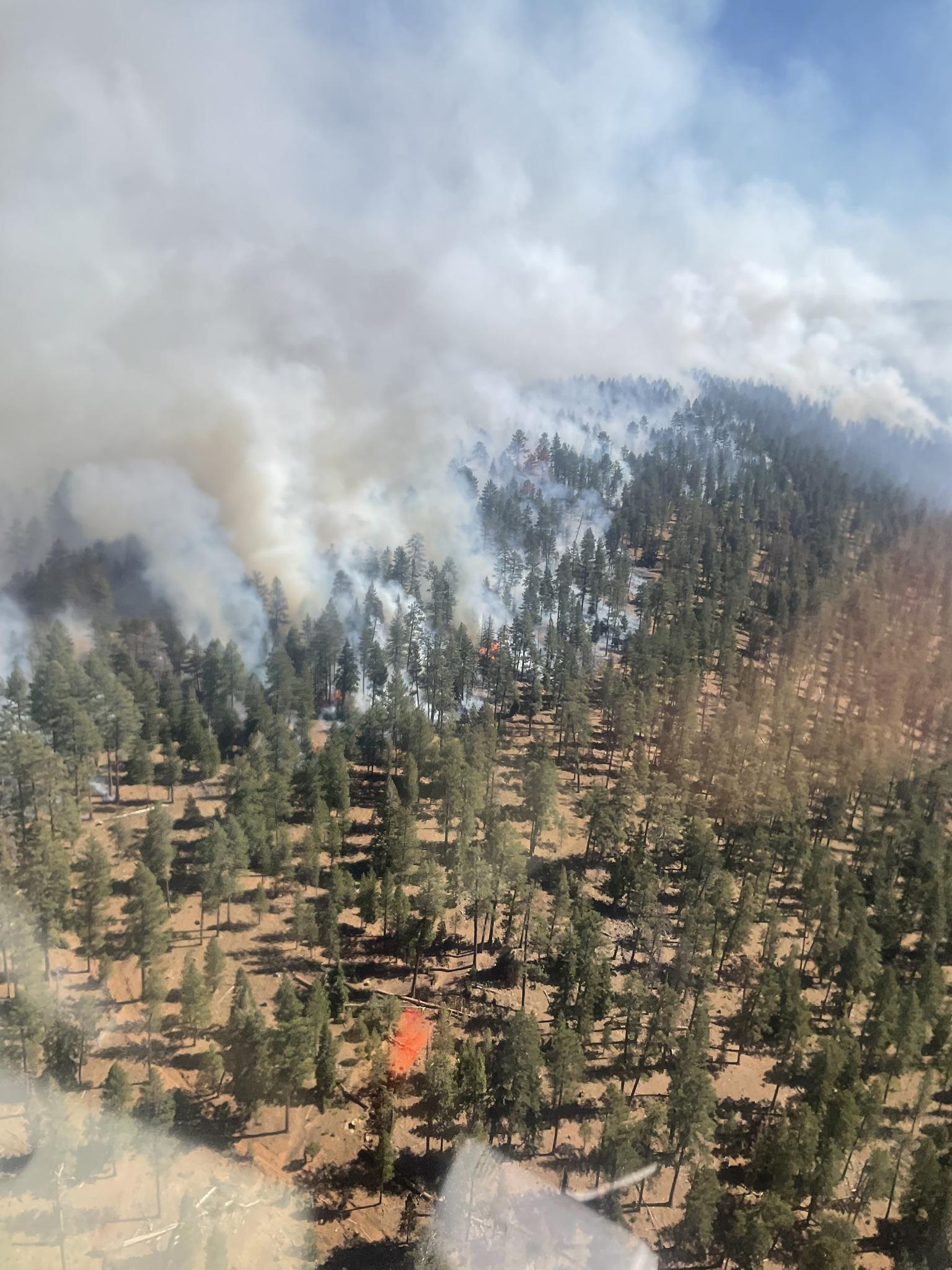 Large column from Rail Ridge Fire is visible from a helicopter.