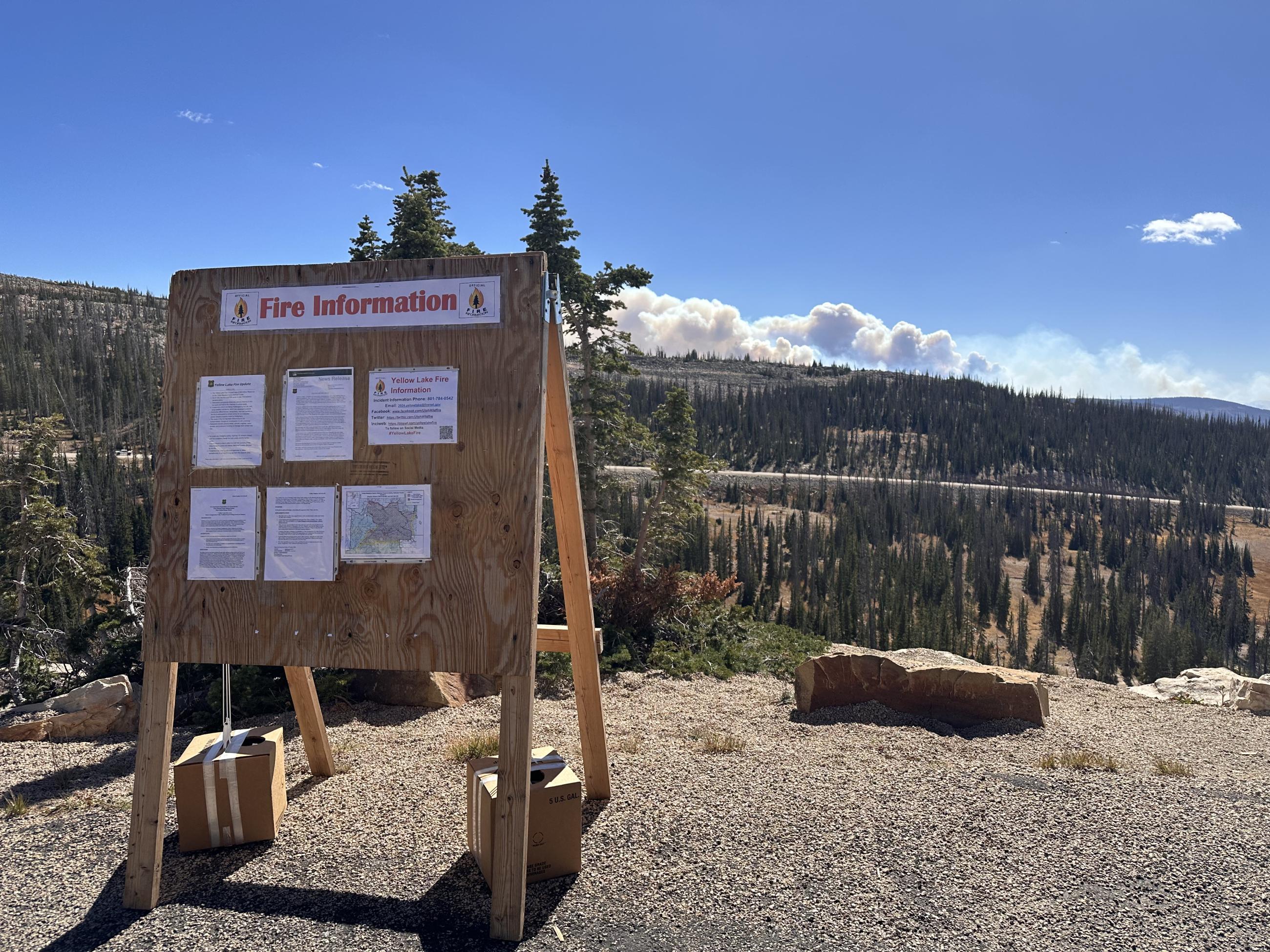 Yellow Lake Fire from the Bald Mt. Overlook, Hwy 150 with fire information board in the foreground