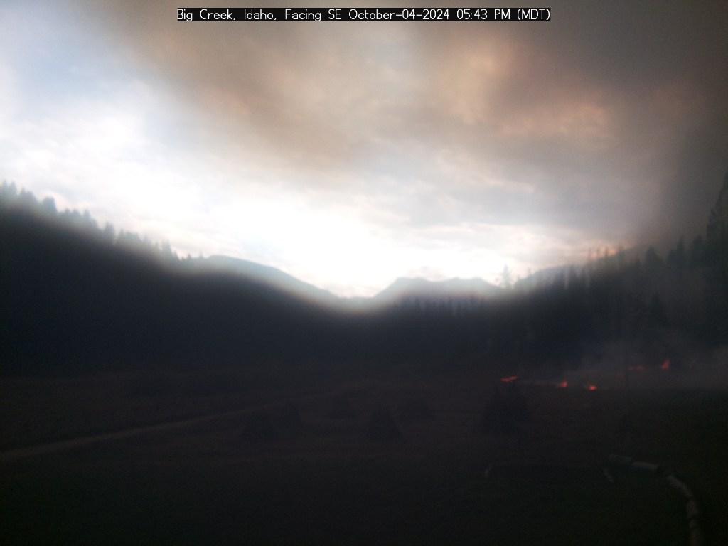 Photo is mostly dark as the fire overshadowed the area at 5:58p.m.