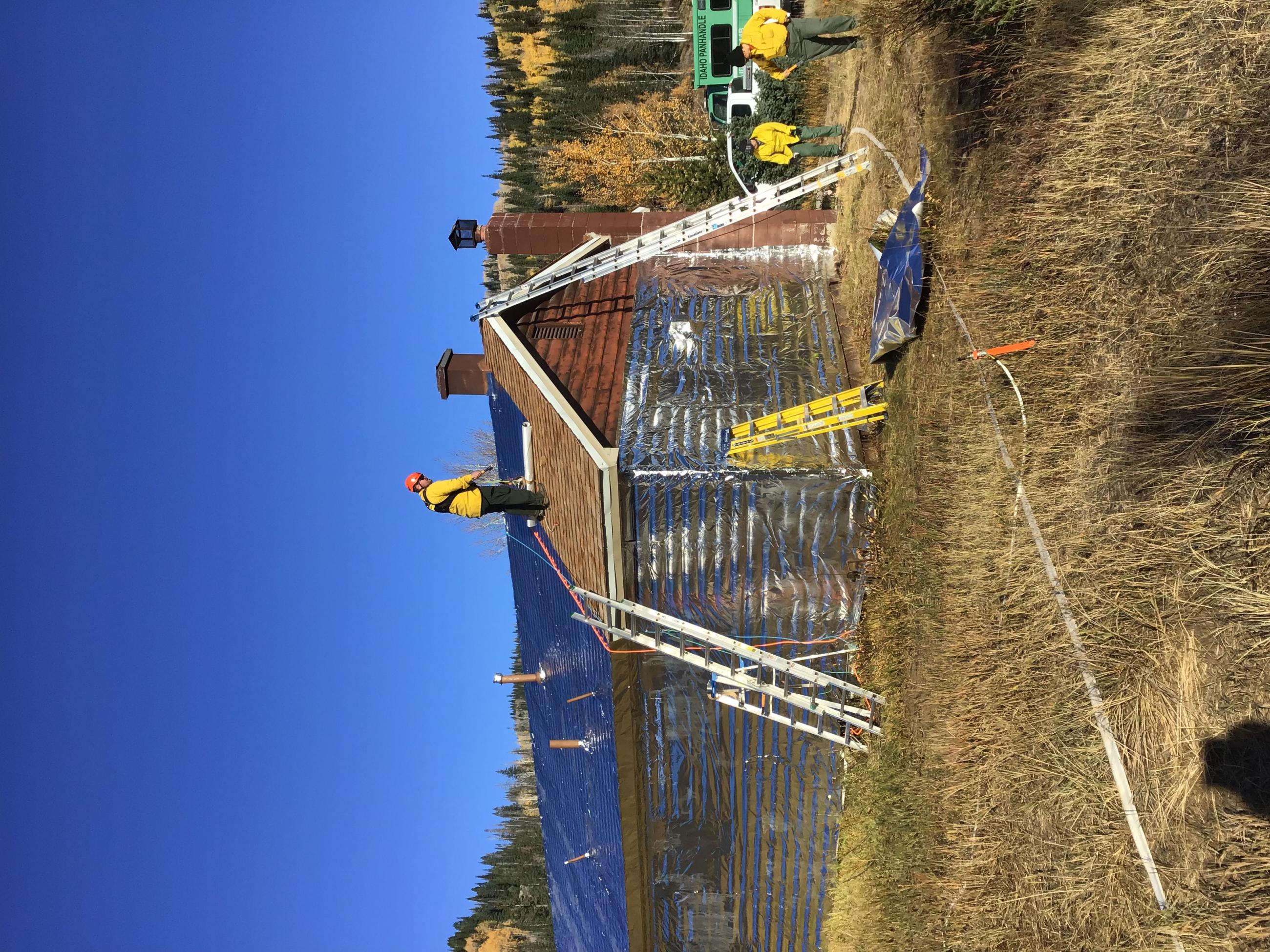 Wrapping the Historic Mill Hallow Ranger Station in Heat Reflective Metal  