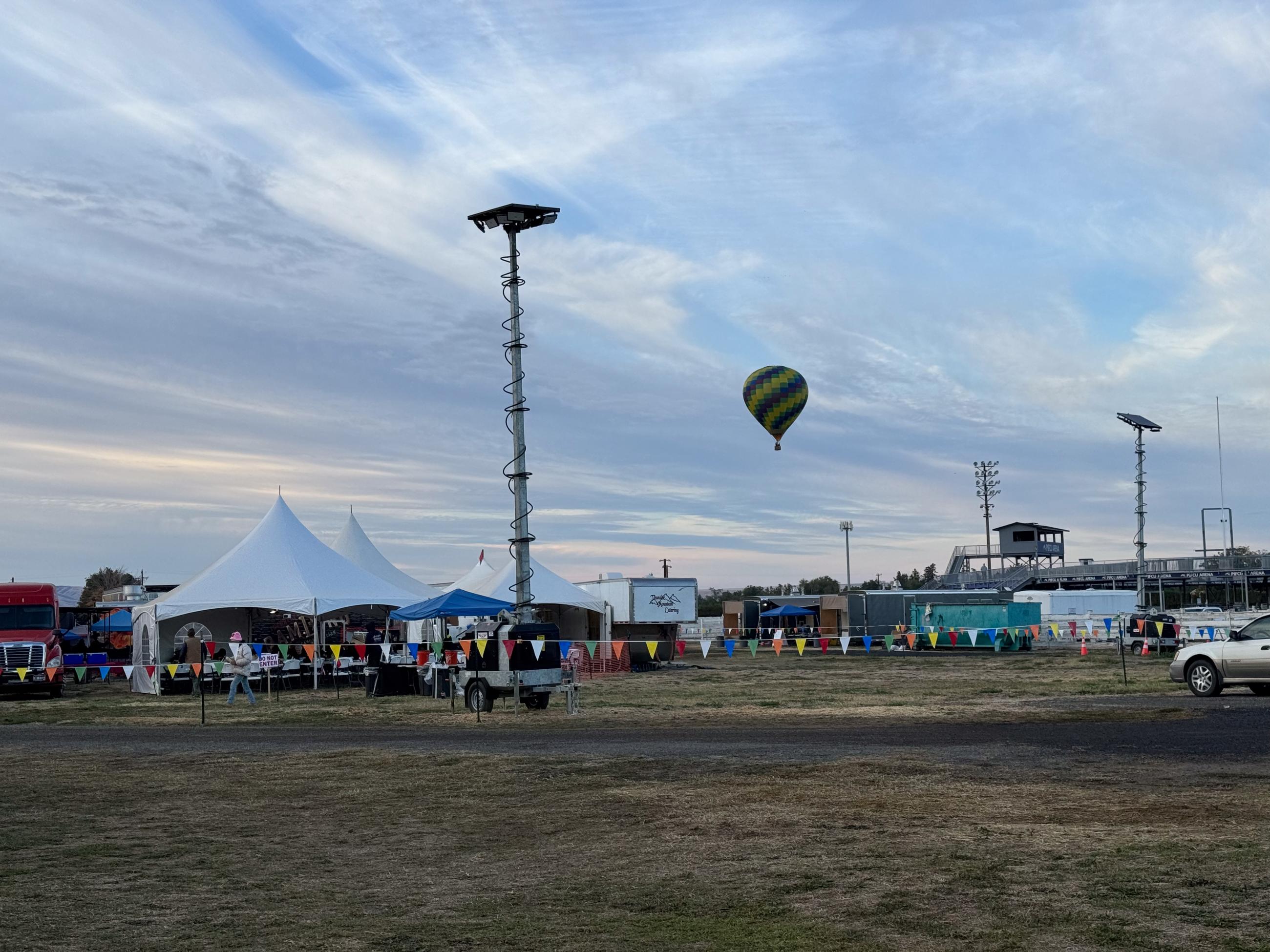 Hot Air balloon rising above the mess hall area of the incident command post