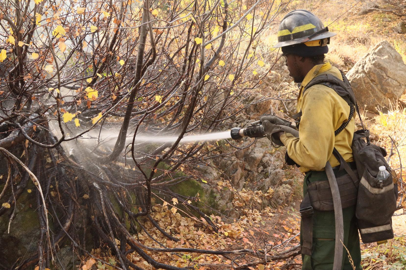 Heatseeker Engine Crewmember Sprays Hot Spot