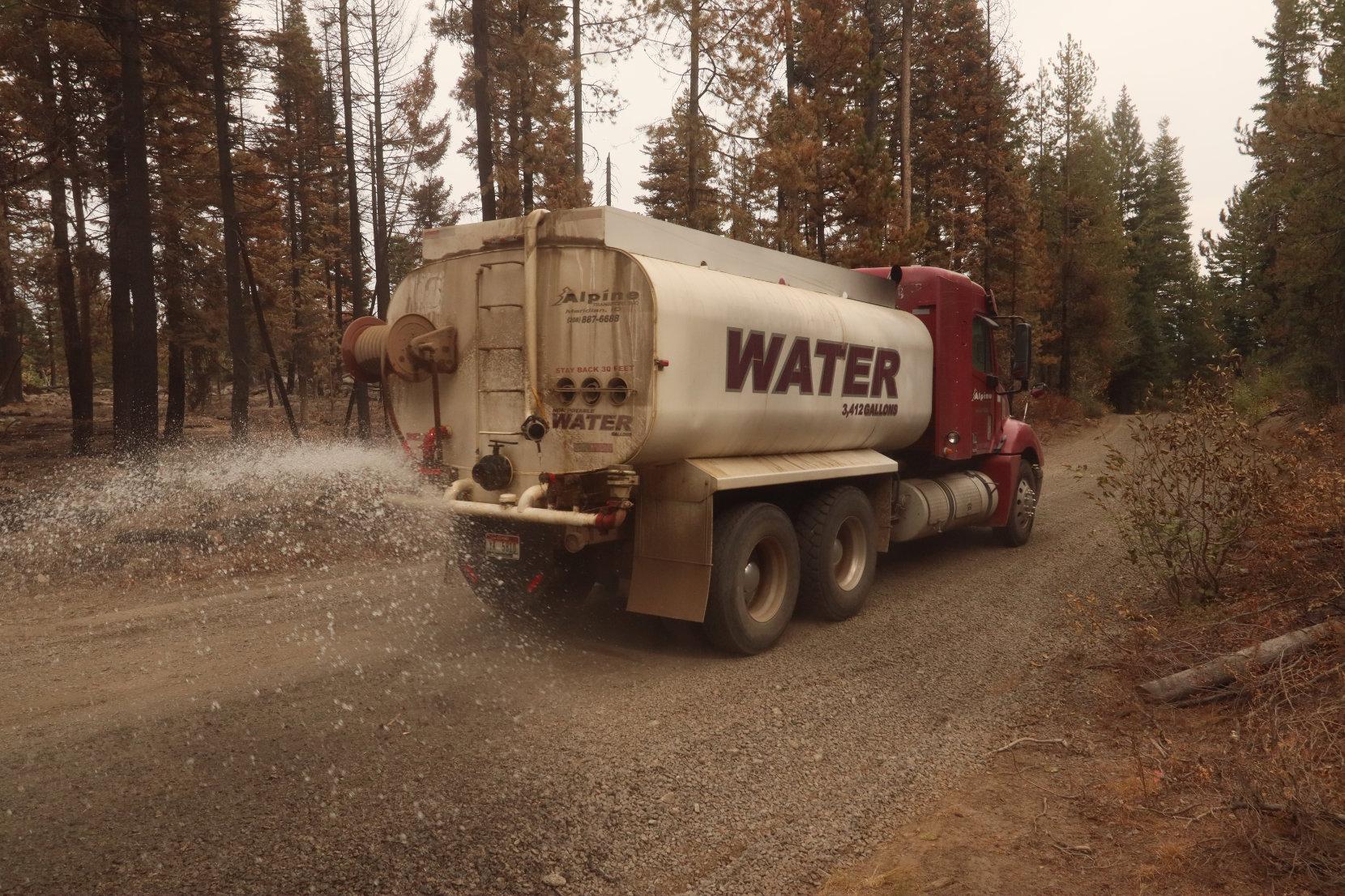 Water Tender Sprays Road