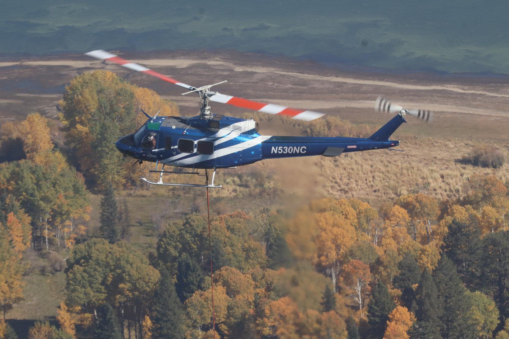 Helicopter Hovers Over Lookout Rock 