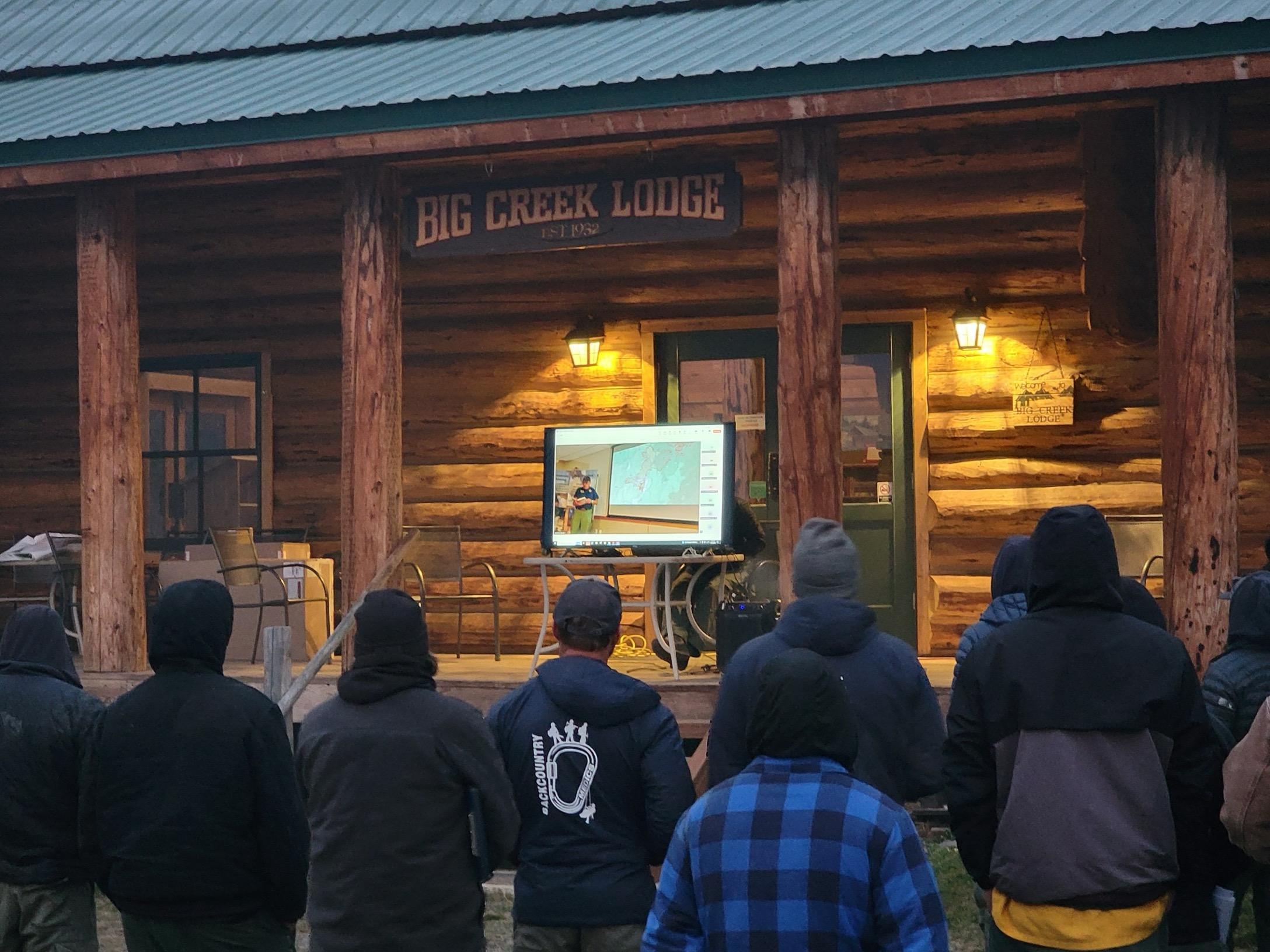 Morning briefing at Big Creek Lodge for incident personnel