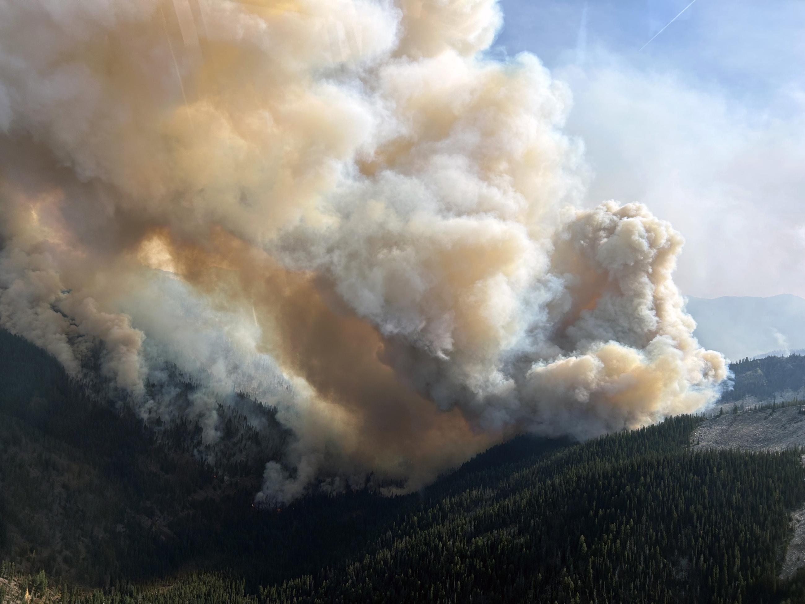 Photos shows the fire burning in Smith Creek.