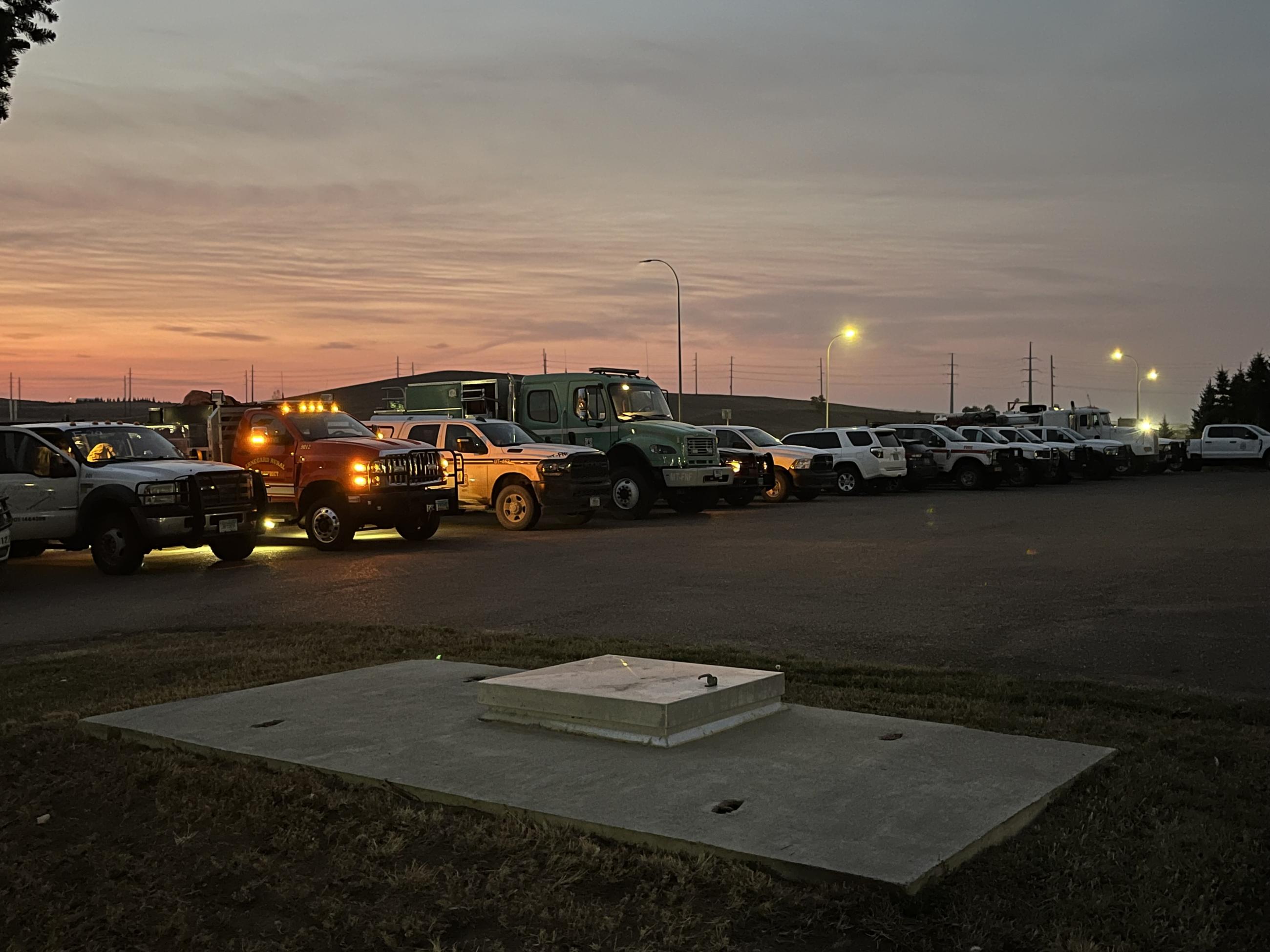 Fire engines and other vehicles parked at briefing