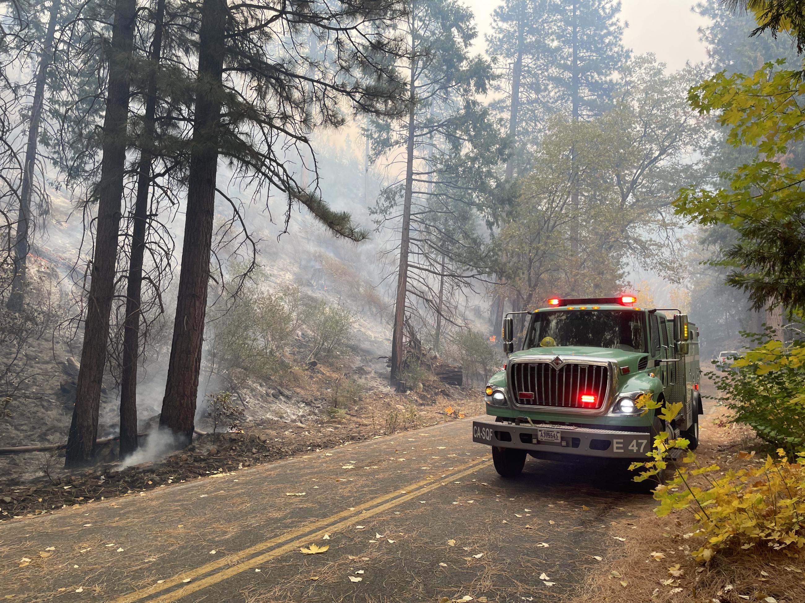 Engine SQF E347 assisting with firing operations on north side of Hwy 180.