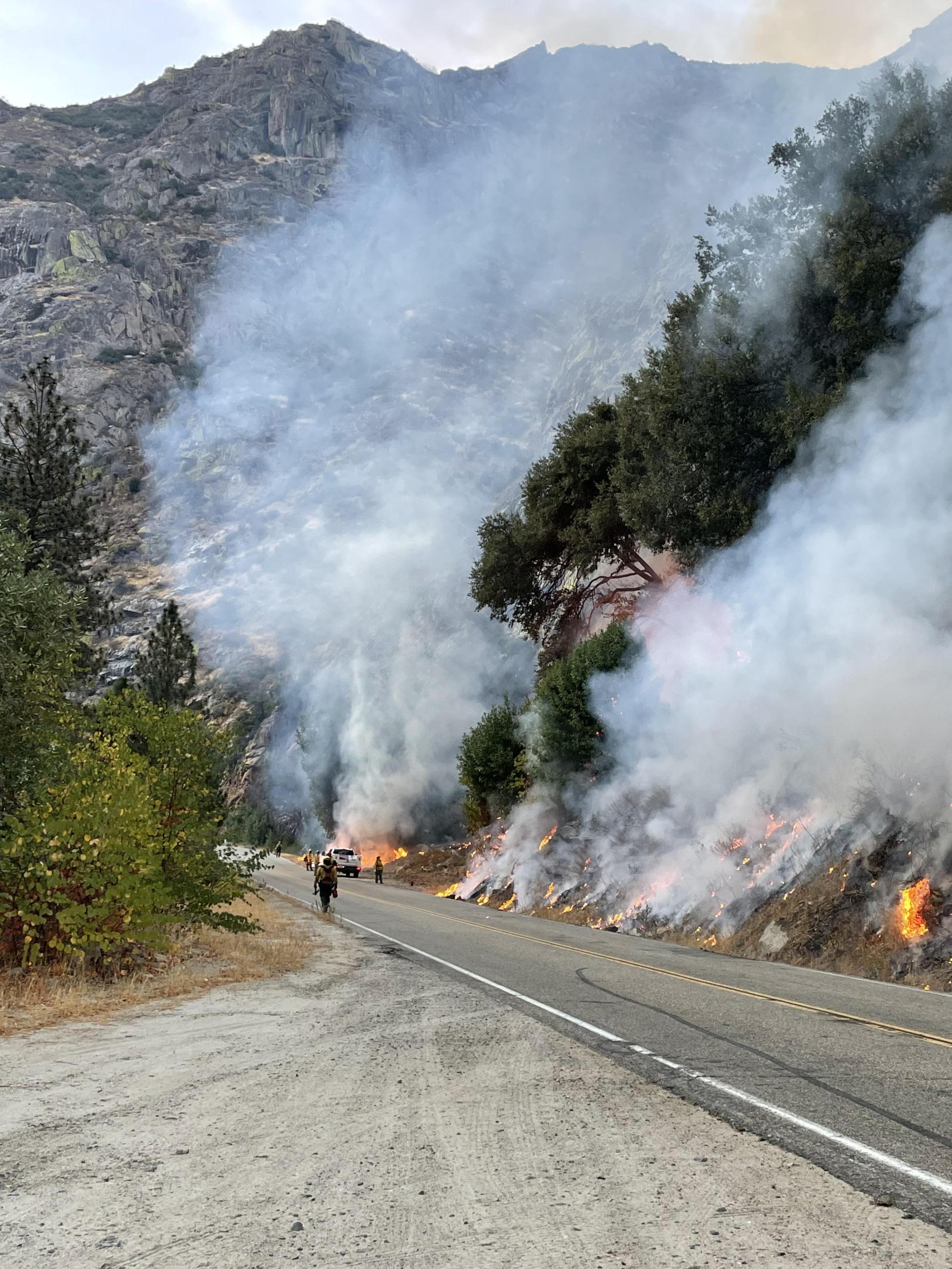 Crews firing along north side of Hwy 180 west of Grizzly Falls.